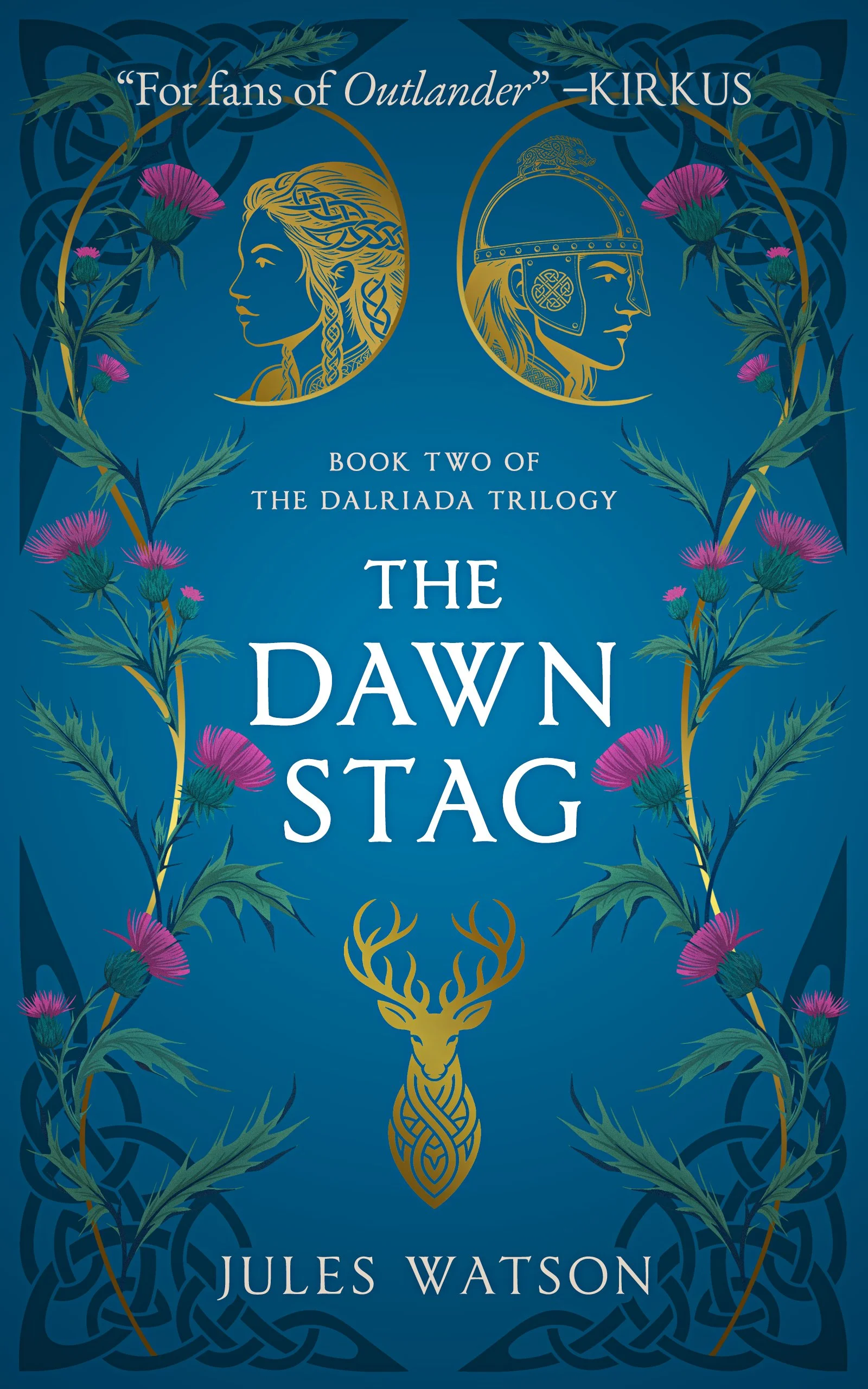 Book cover titled ‘The Dawn Stag’ by Jules Watson, Book Two of the Dalraida Trilogy. Featuring gold-lined profiles of Rhiann and Eremon, surrounded by pink thistle flowers, with a decorative Celtic knot background and a gold stag at bottom.