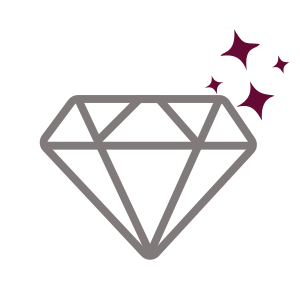 A gray diamond graphic with three purple sparkles in the background on a black background.