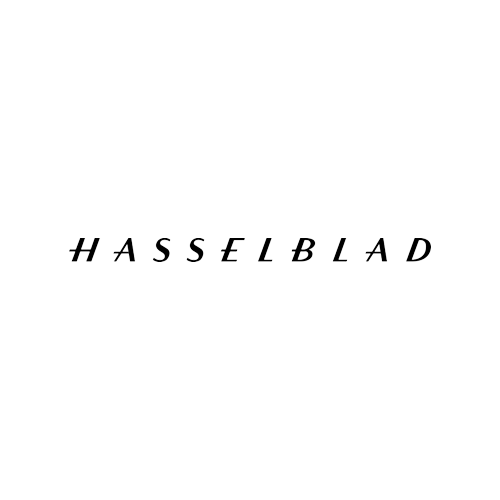 The image shows a black background with the word "HASSELBLAD" written in stylized white letters.
