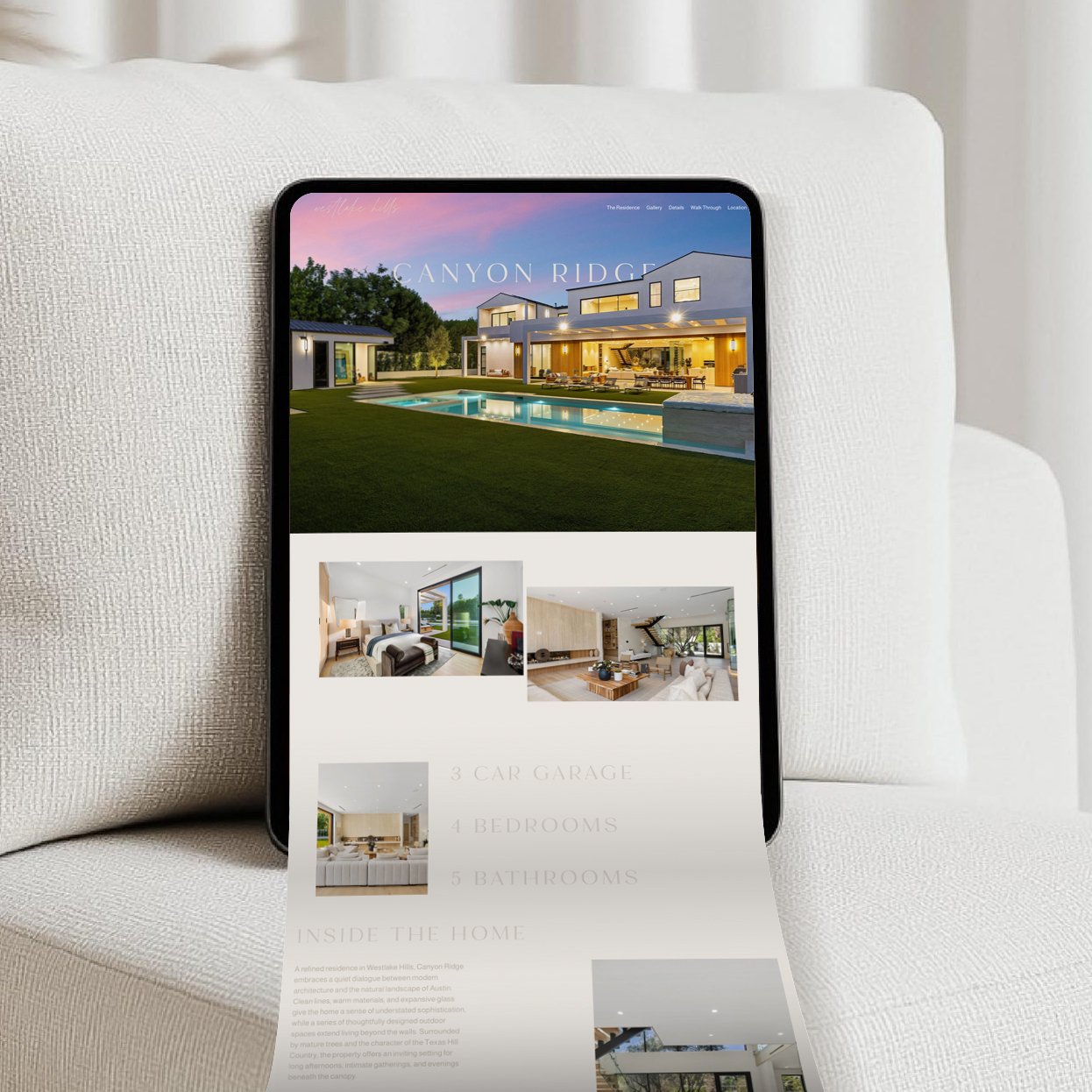Digital tablet displaying a real estate web page with images of a modern house, a bedroom, a living room, and other interior spaces, with some descriptive text about the property.