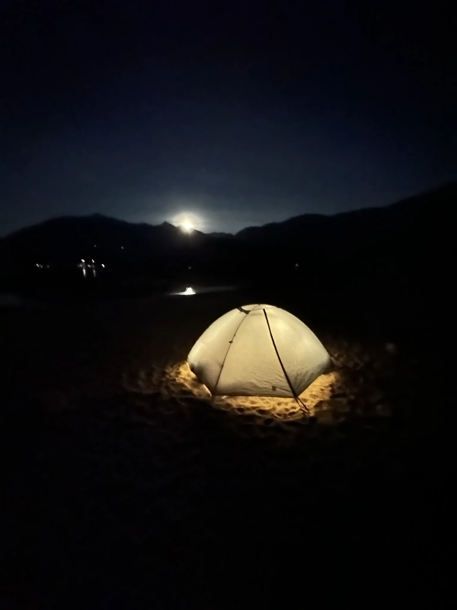 full moon and lit tent.jpeg