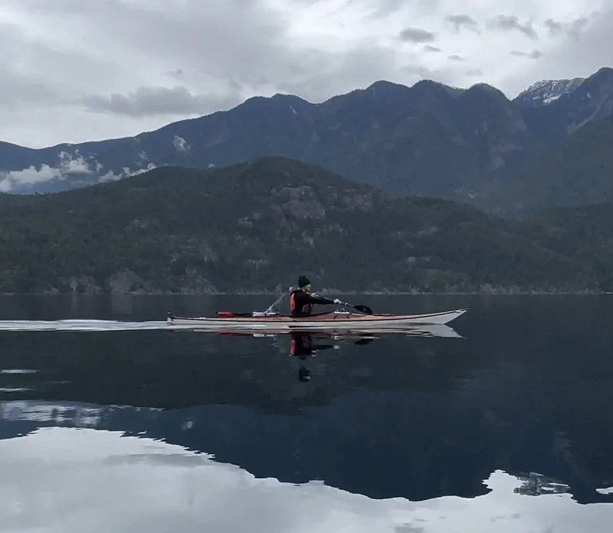 Naomi paddling on Slocan Lake.jpeg