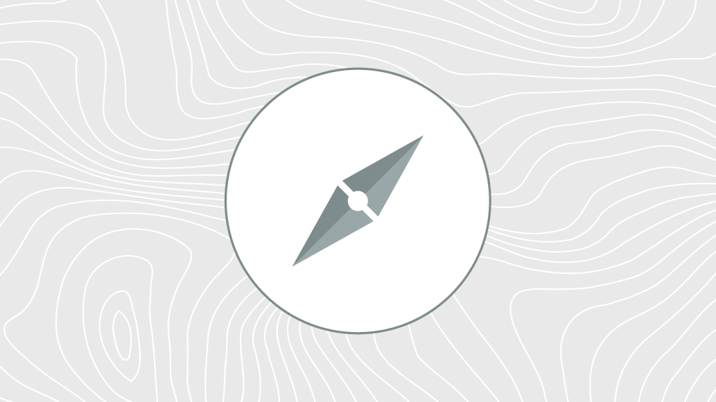 A compass on a topographic map background.