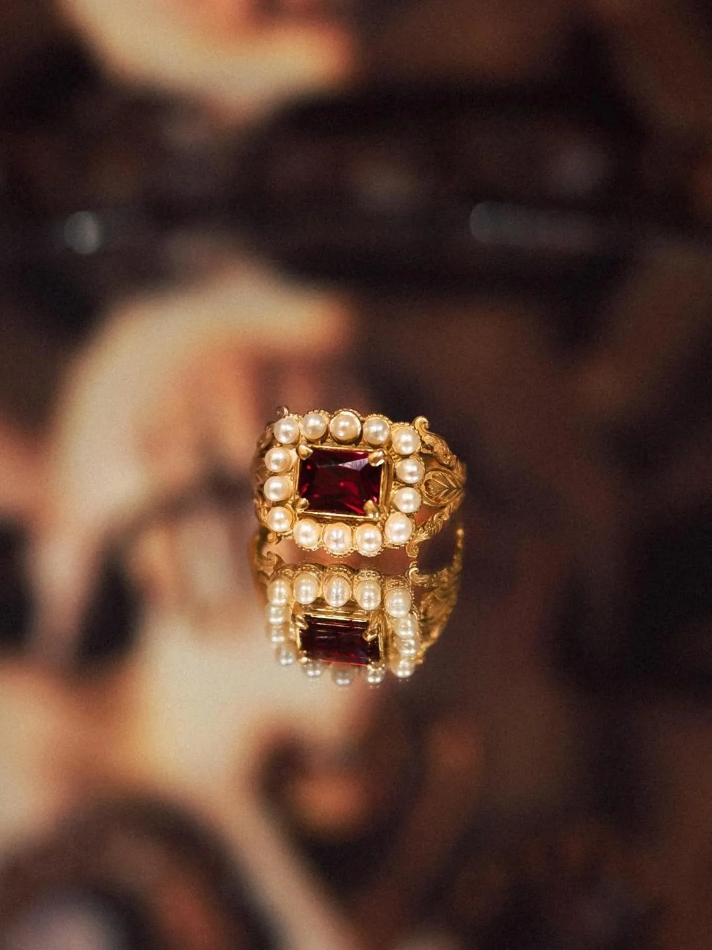 The Weeping Heart Ring.

Victorian-inspired, made in 22ct gold with freshwater pearls and an ethical ruby.

Pearls have long carried associations with tears in mourning jewellery, not only as symbols of sorrow, but as small forms shaped through time,