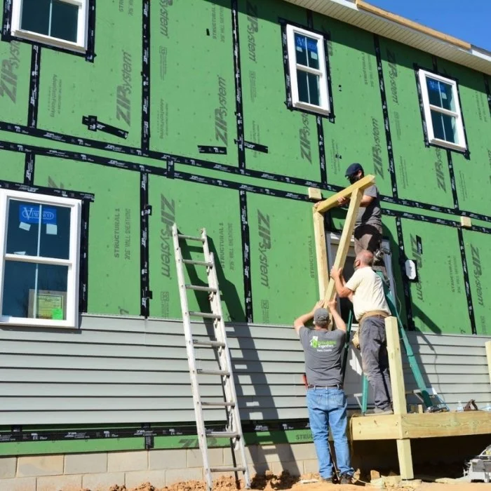 KAH team building a house