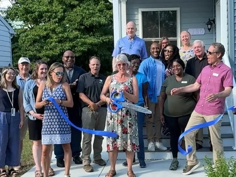 ribbon cutting at new home