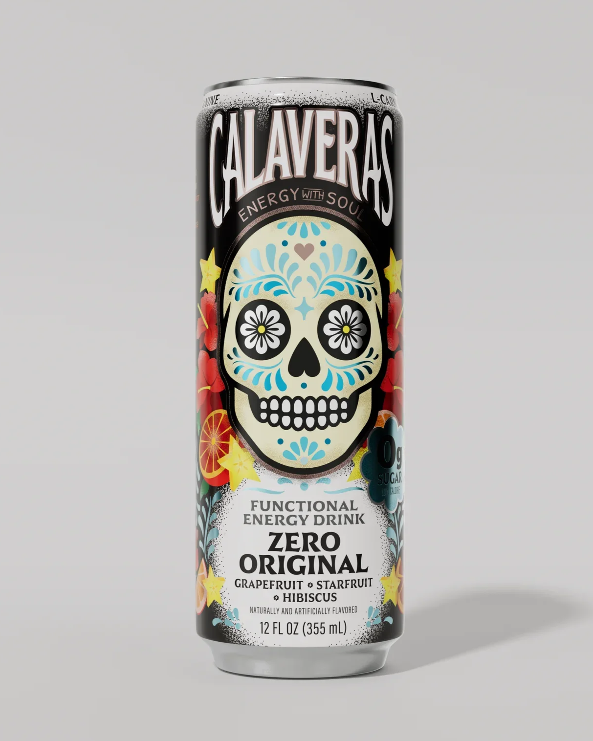 A can of Claveras energy drink with a decorative sugar skull design and colorful fruit graphics, labeled as zero calories with grapefruit, starfruit, and hibiscus flavors.