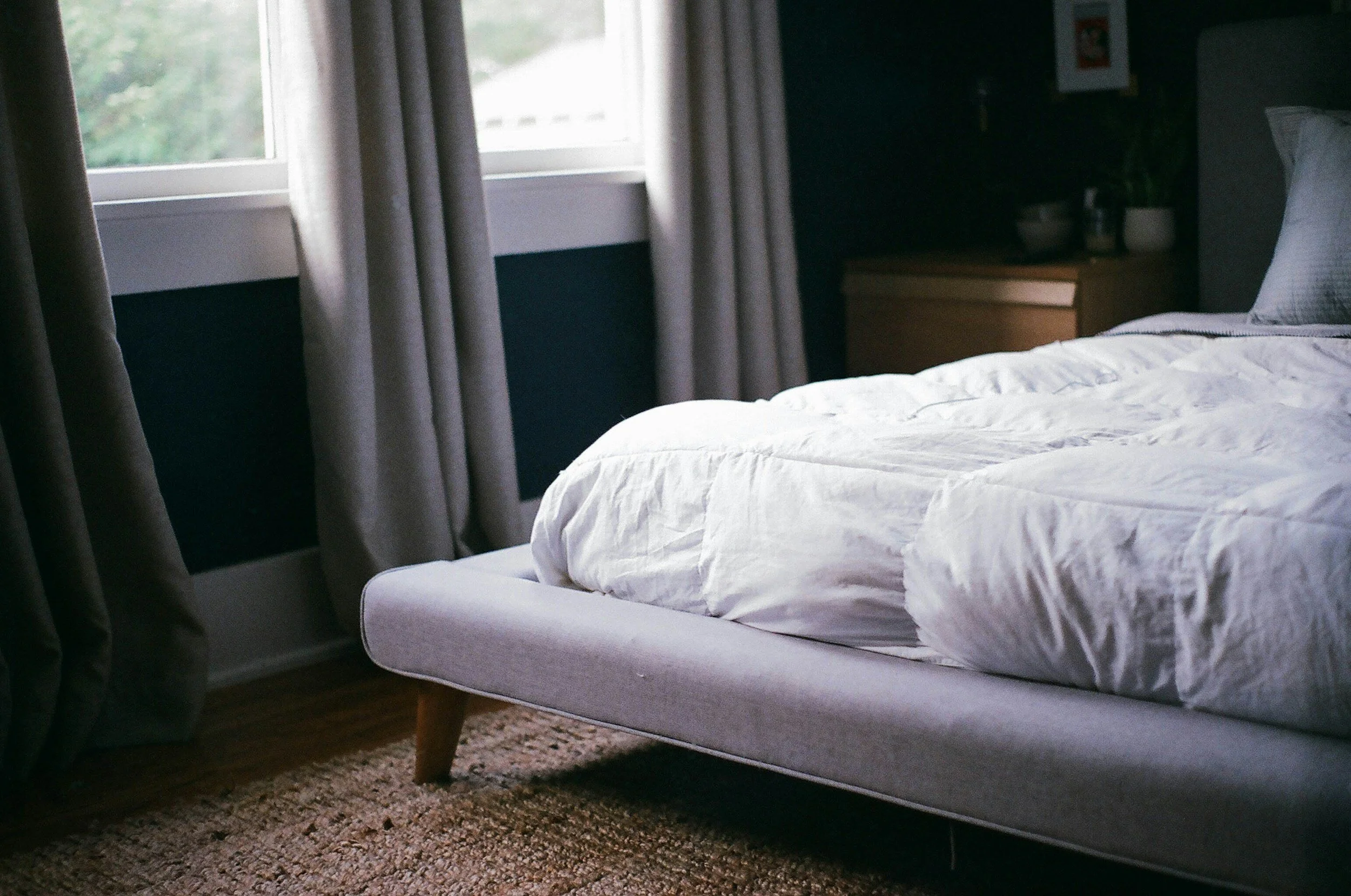 The Notebook and the Card on the Bed