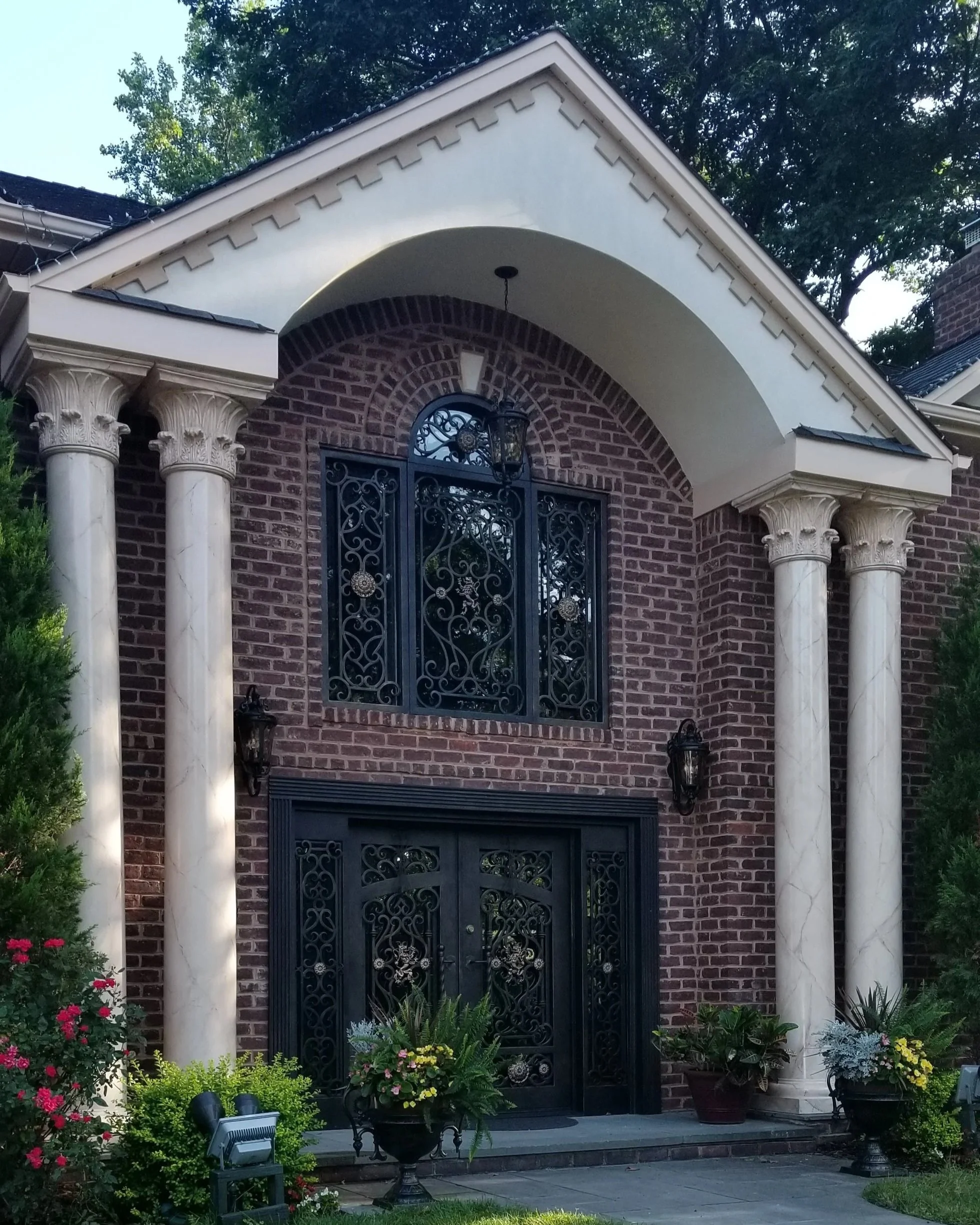 Faux marble finish on grand entrance