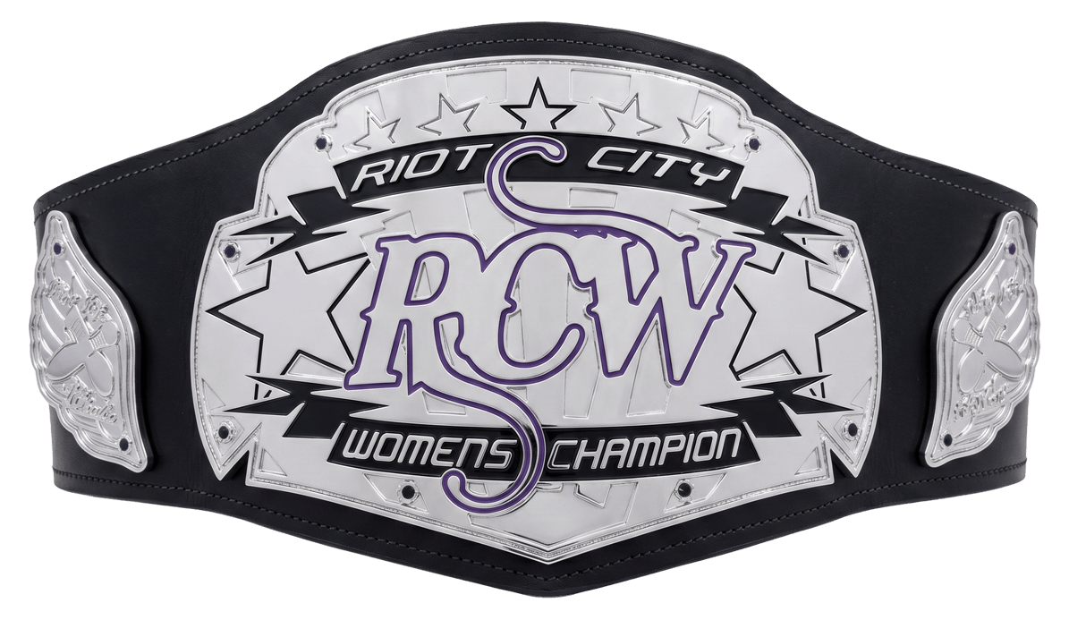 A championship wrestling belt with a black strap and metallic plates, featuring the text 'Riot City Women's Champion' and a purple 'RCW' logo in the center.