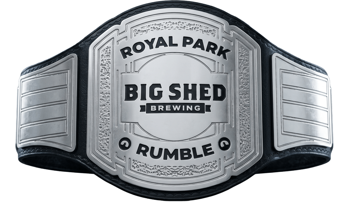 A wrestling championship belt with the text "Royal Park Big Shed Brewing Rumble" engraved on it.