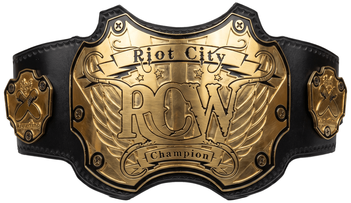 A championship wrestling belt with a gold central plate engraved with "RCW Champion" and black leather strap with gold side plates.