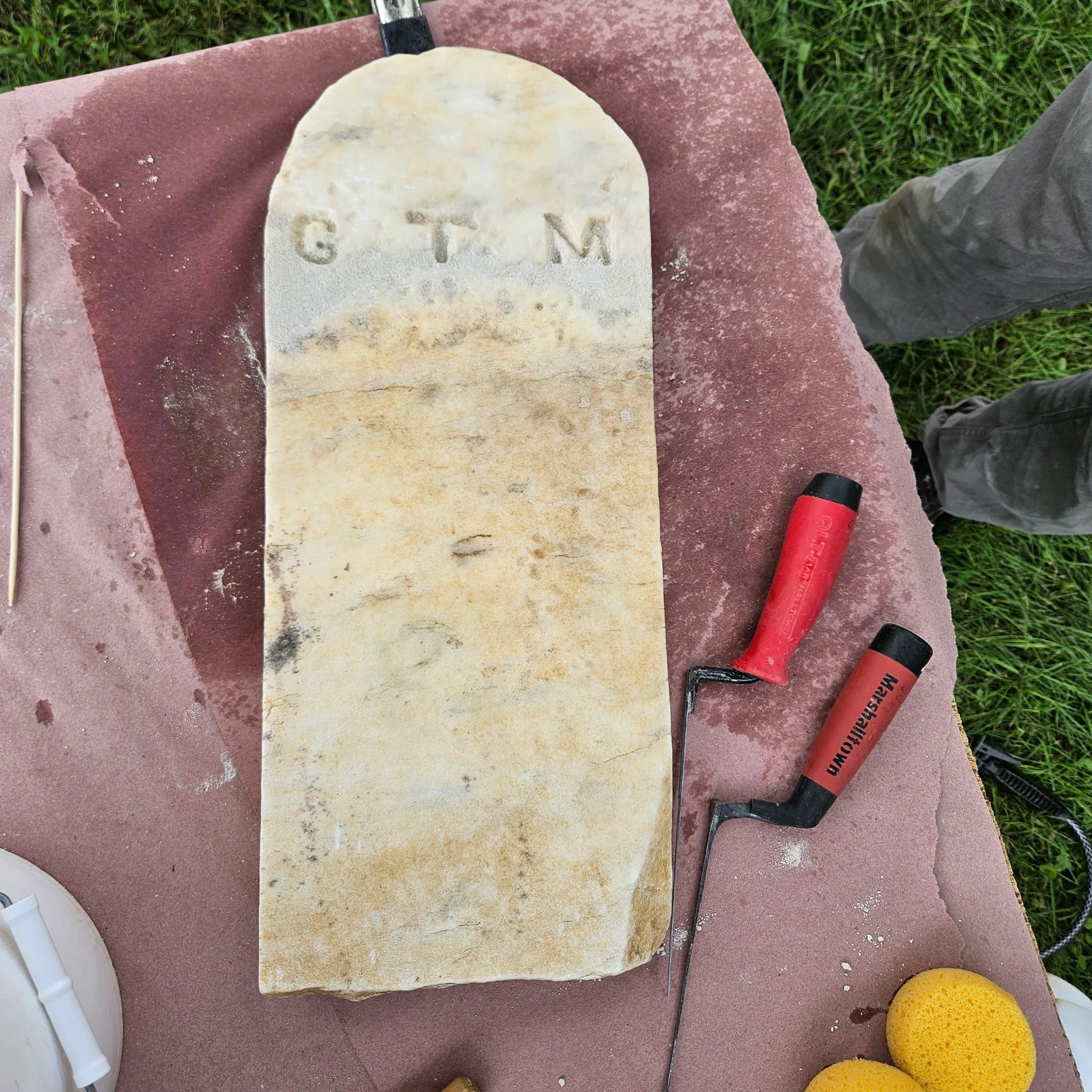 Footstone after cleaning and resetting