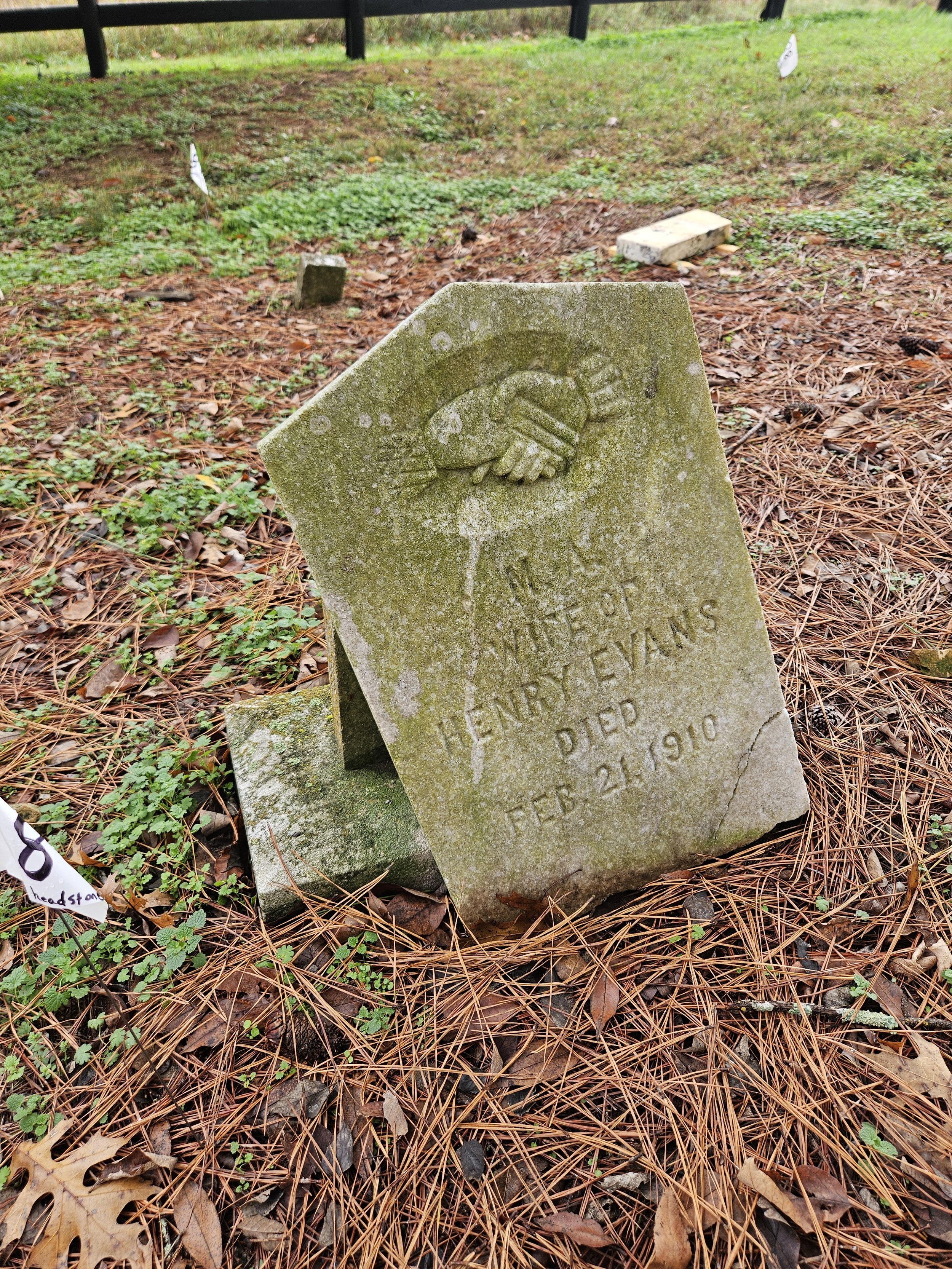 Headstone of M.A., wife of Henry Evans prior to resetting and cleaning