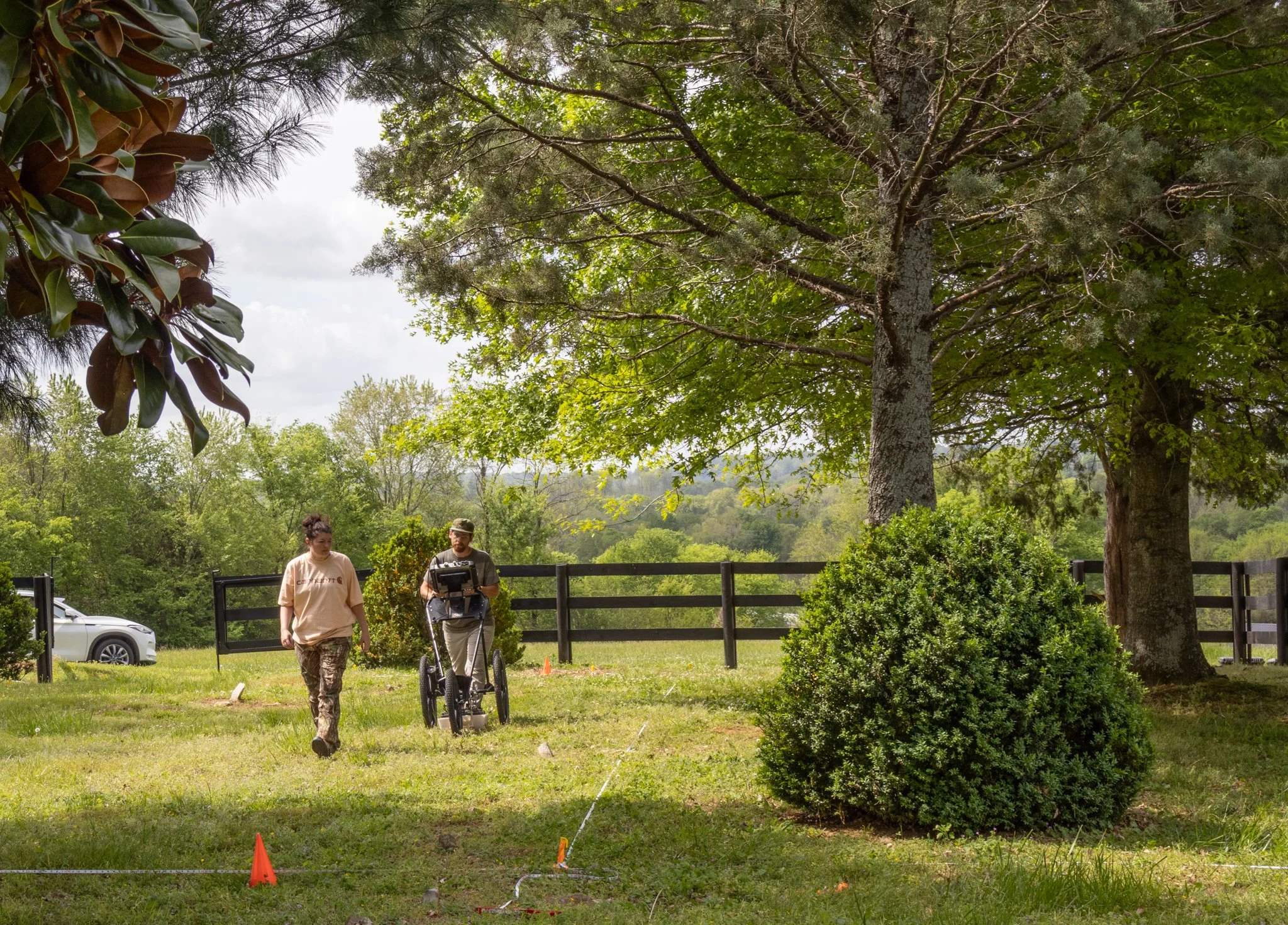Claiborne and Alli investigating Grid 4 of the cemetery.