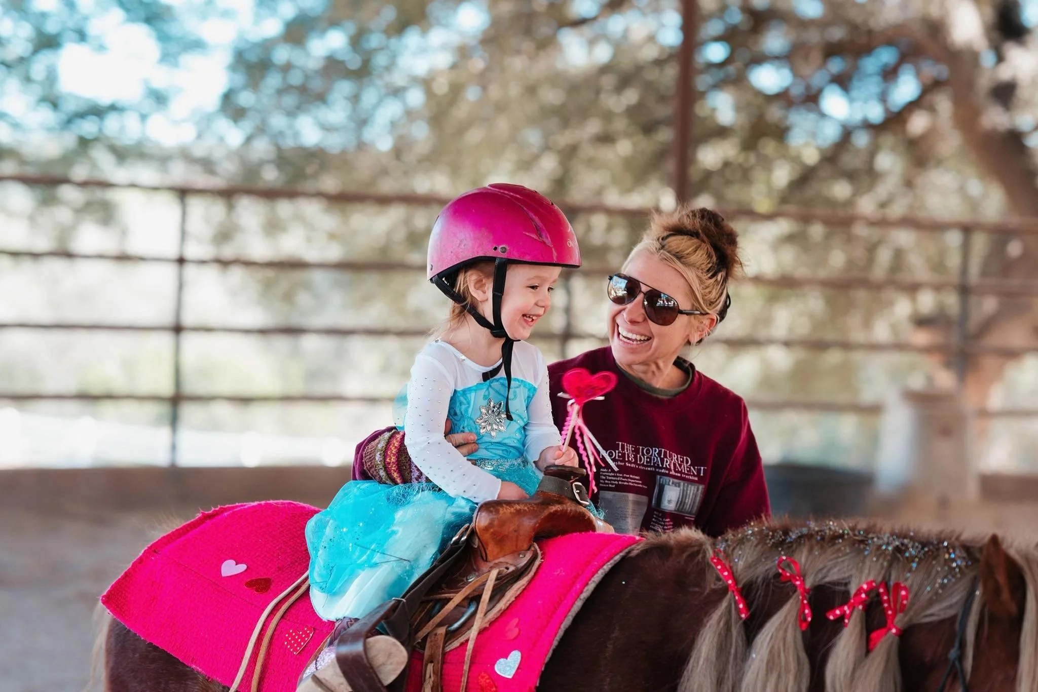 Young child taking a riding lesson at The Gentle Cowgirl in Stockdale, TX — beginner horseback riding lessons for kids near San Antonio