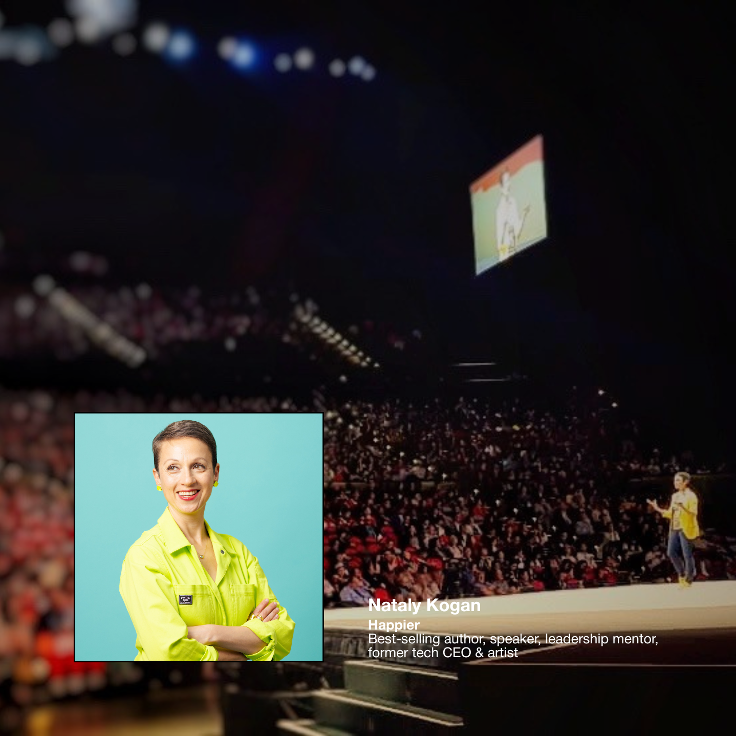 A woman with short hair, wearing a yellow jacket, smiling with her arms crossed, set against a light blue background.