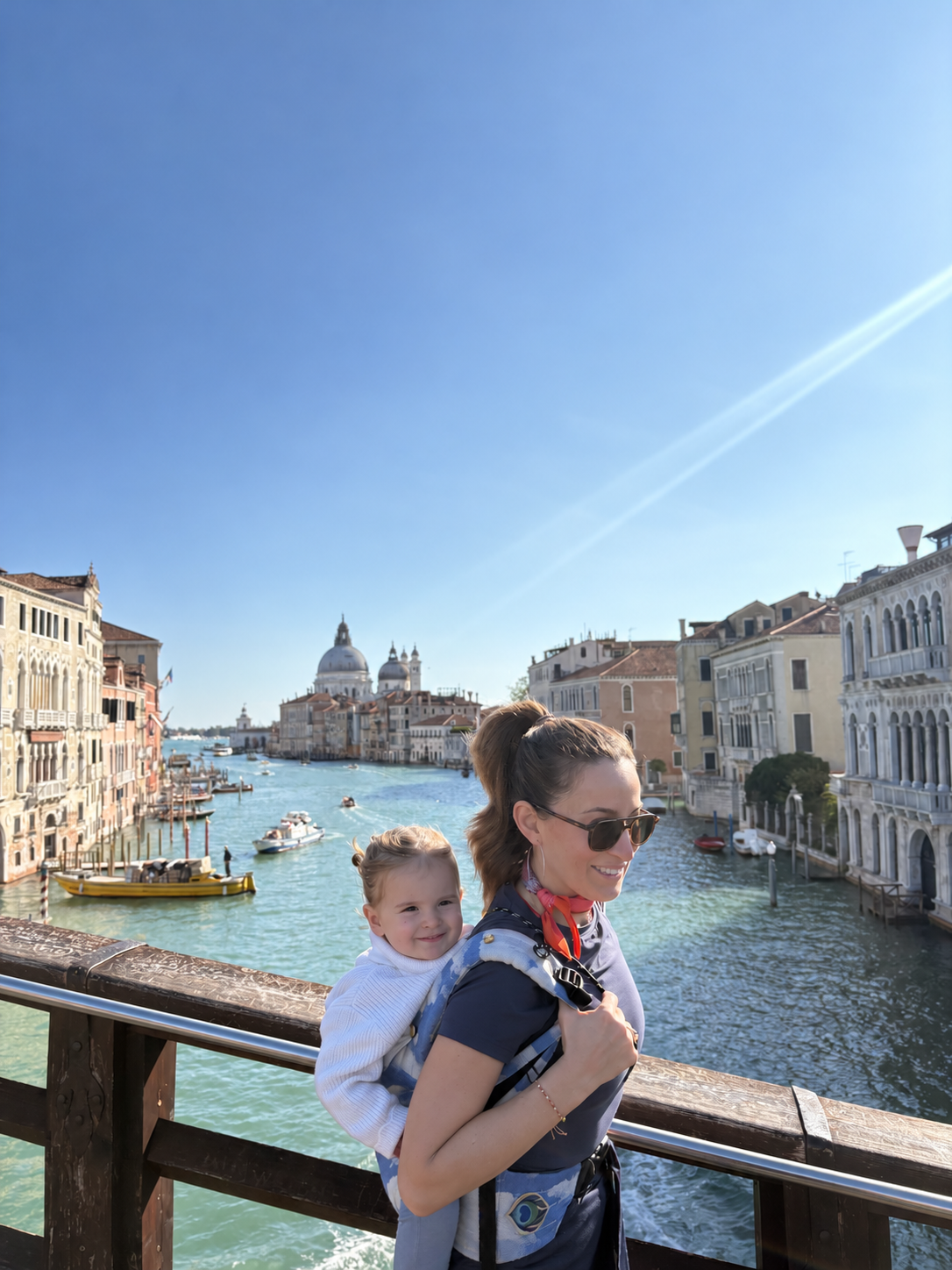 Smiling in Sunlit Venice.png