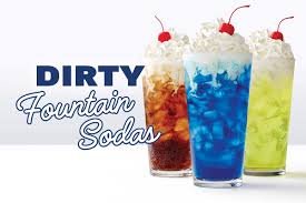 Three colorful fountain sodas in tall glasses with cherries on top, labeled as Dirty Fountain Sodas.