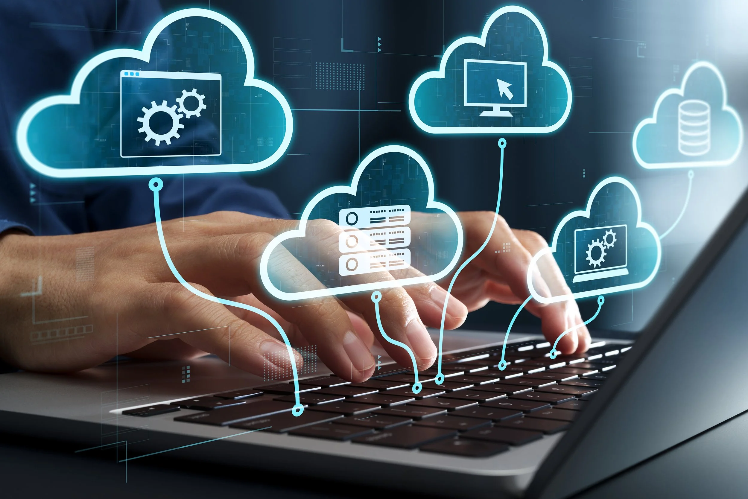 Person using a laptop with digital cloud icons representing cloud computing, data storage, and server management projections over the keyboard.
