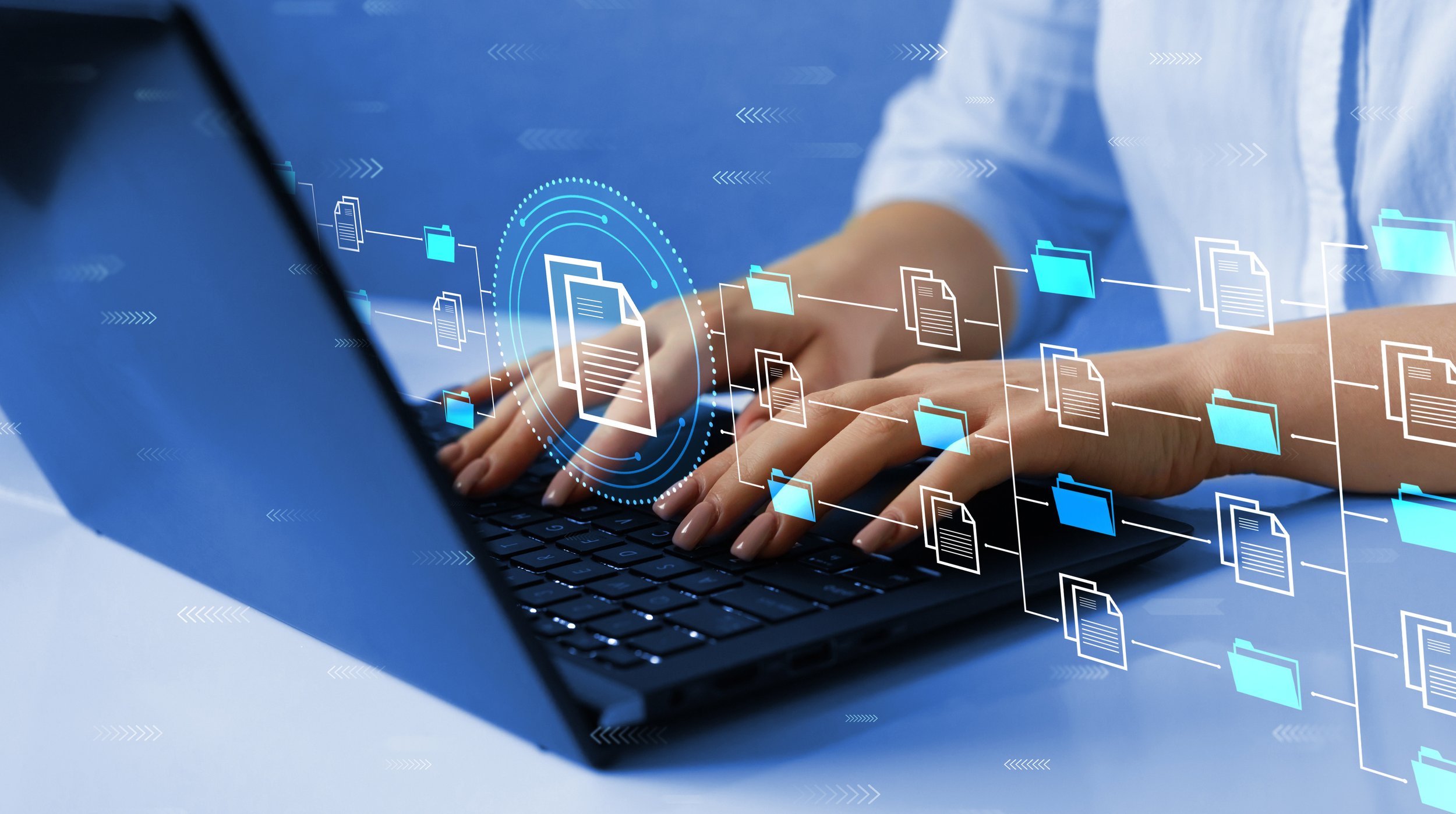 Person typing on a laptop with digital file and folder icons overlayed, indicating digital data management or sharing.