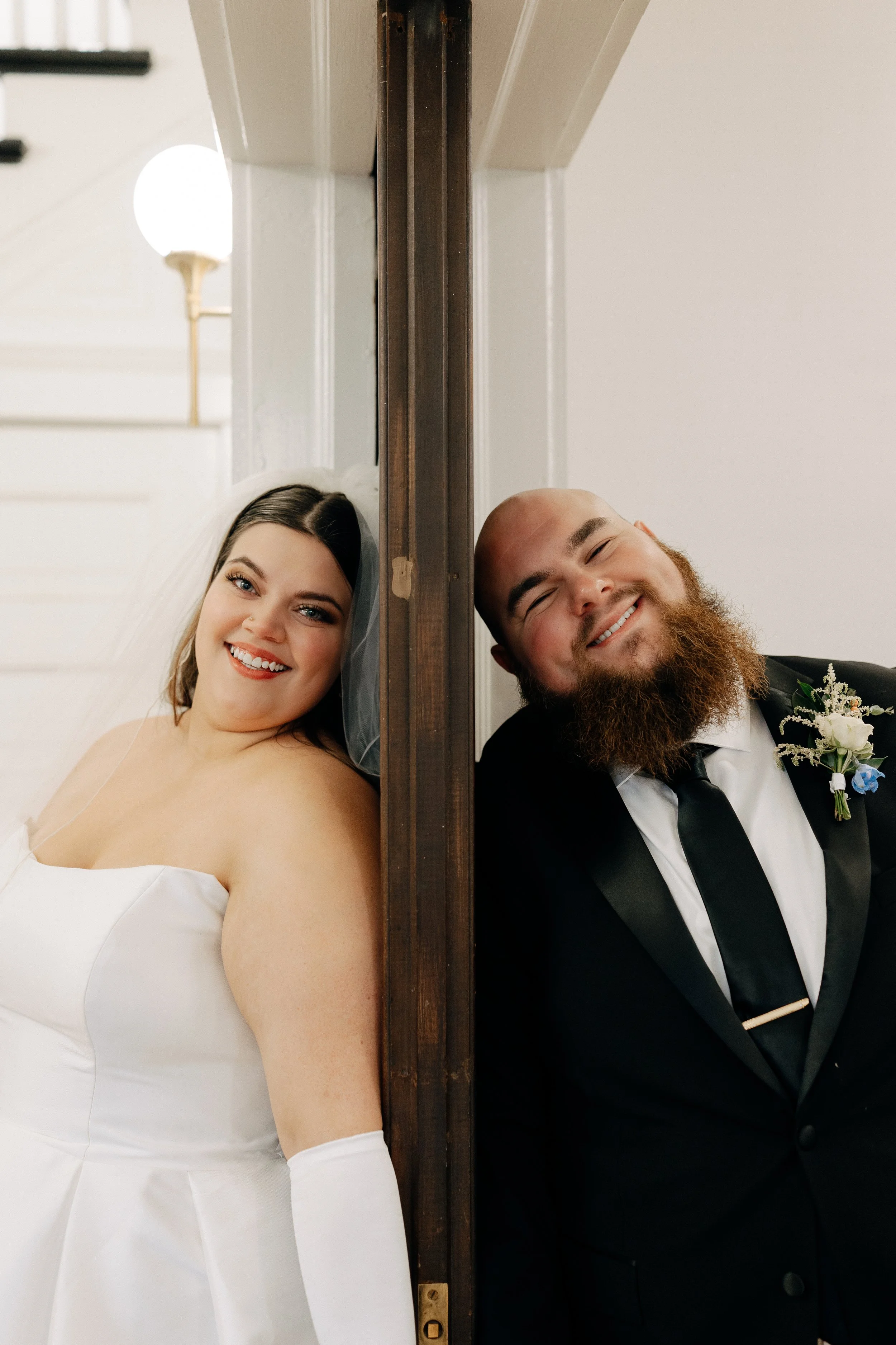 Classy bride and groom smiling before first look indoor venue in Chattanooga Tennessee - Chattanooga wedding photography