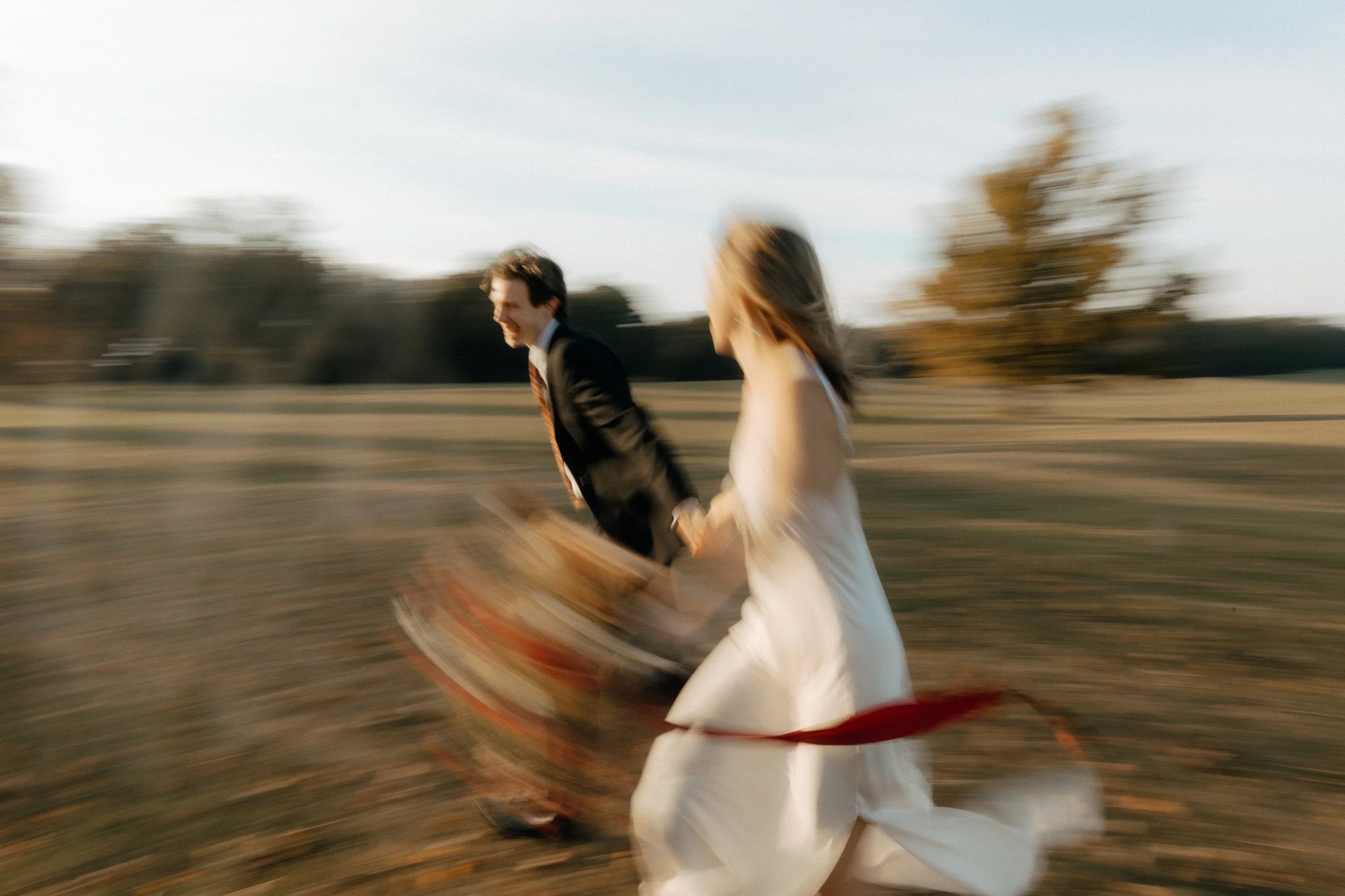 Wedding Couple hand in hand running through Chattanooga Battlefields