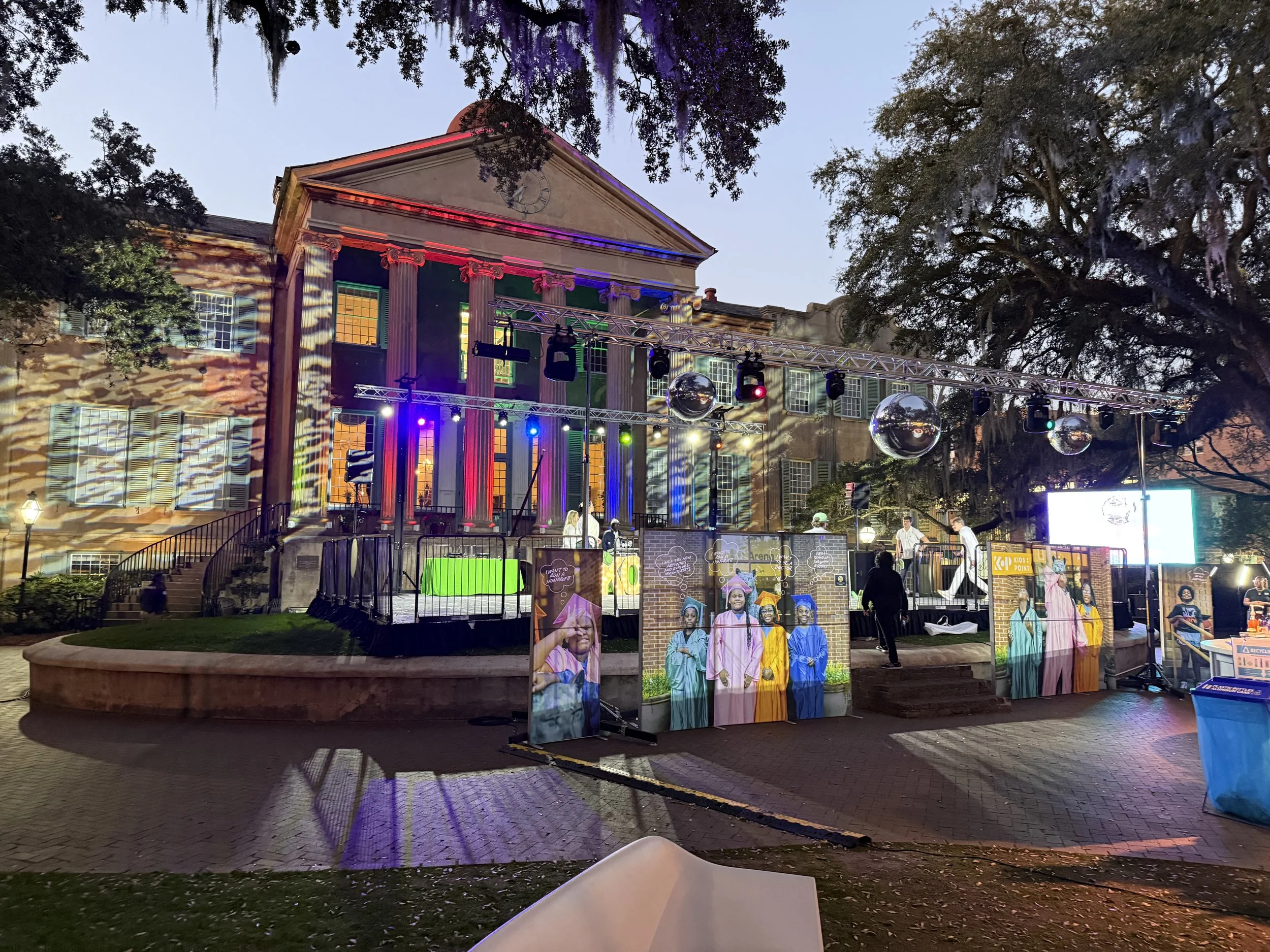 Professional theatrical accent lighting and outdoor stage production services at the College of Charleston Cistern Yard, SC.