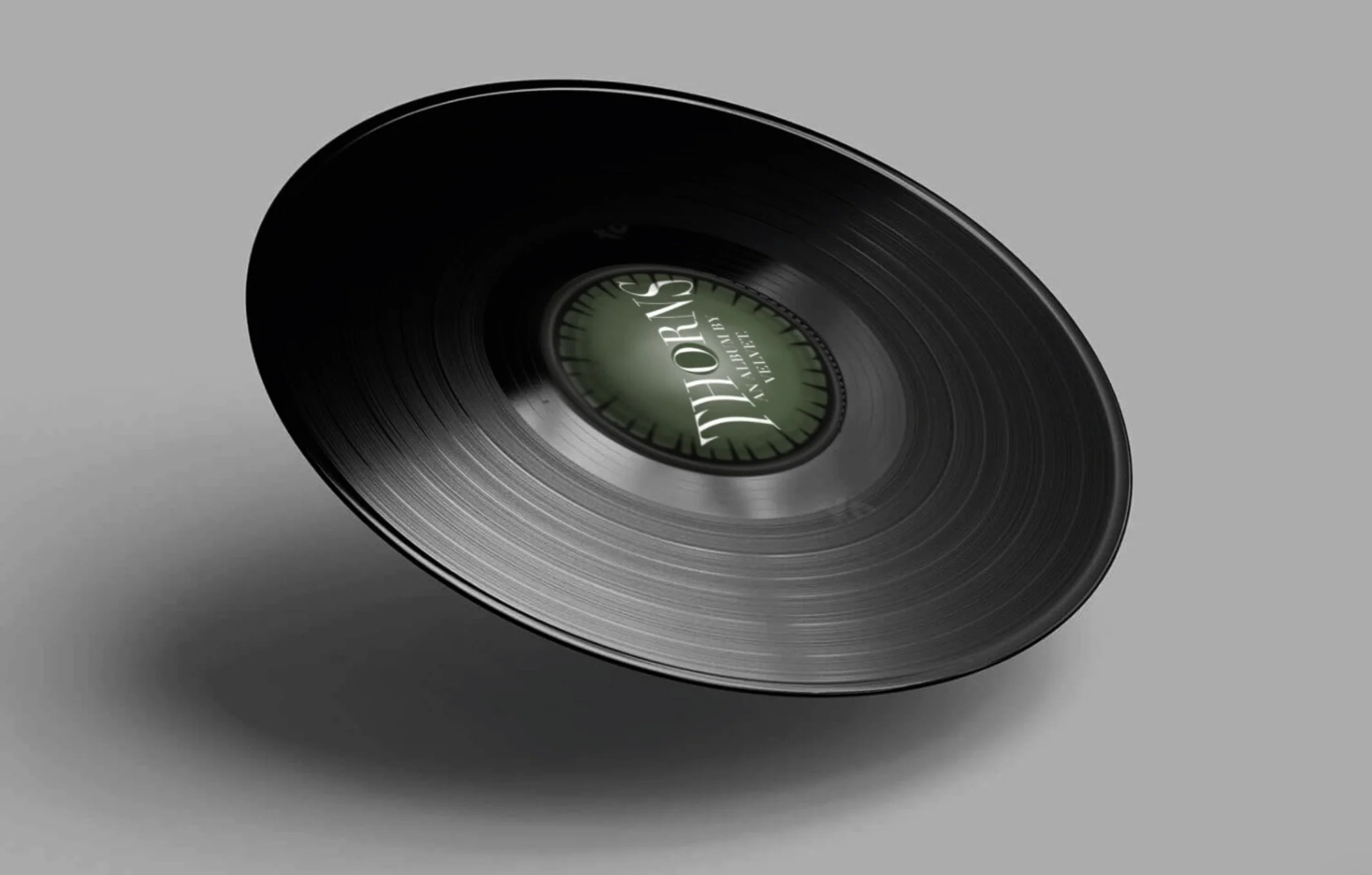 Vinyl design for gothic/indie band 'Velvet', album 'Thorns'. Mockup template sourced from mockups-design.com
