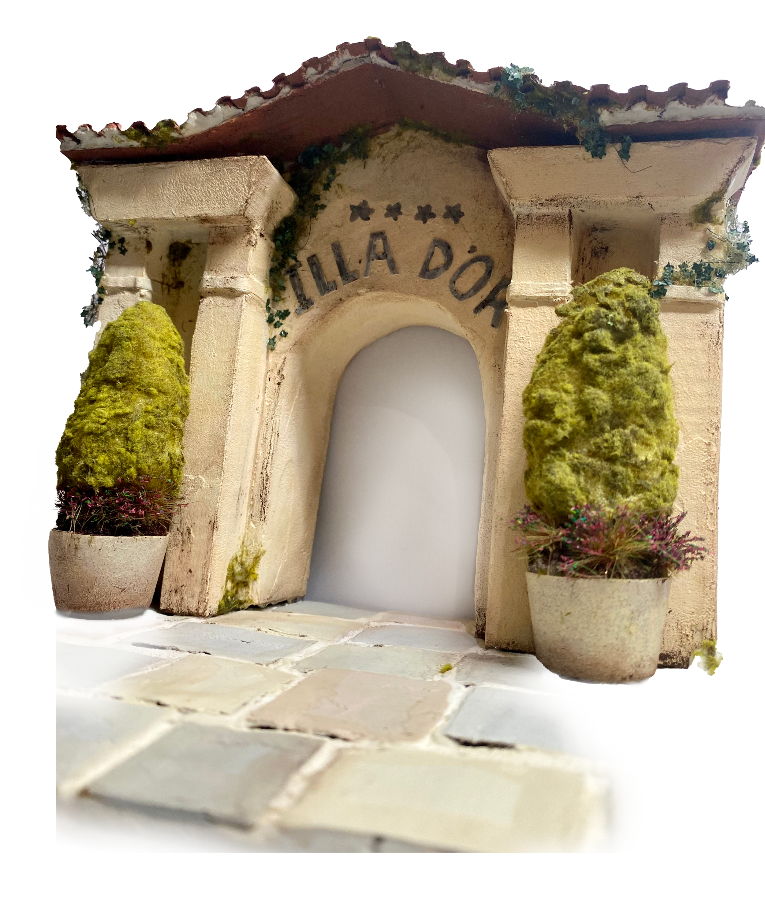 A scale model of the 'Illa D'or Hotel' entrance, commissioned as a gift, made from almost entirely recycled materials. 
