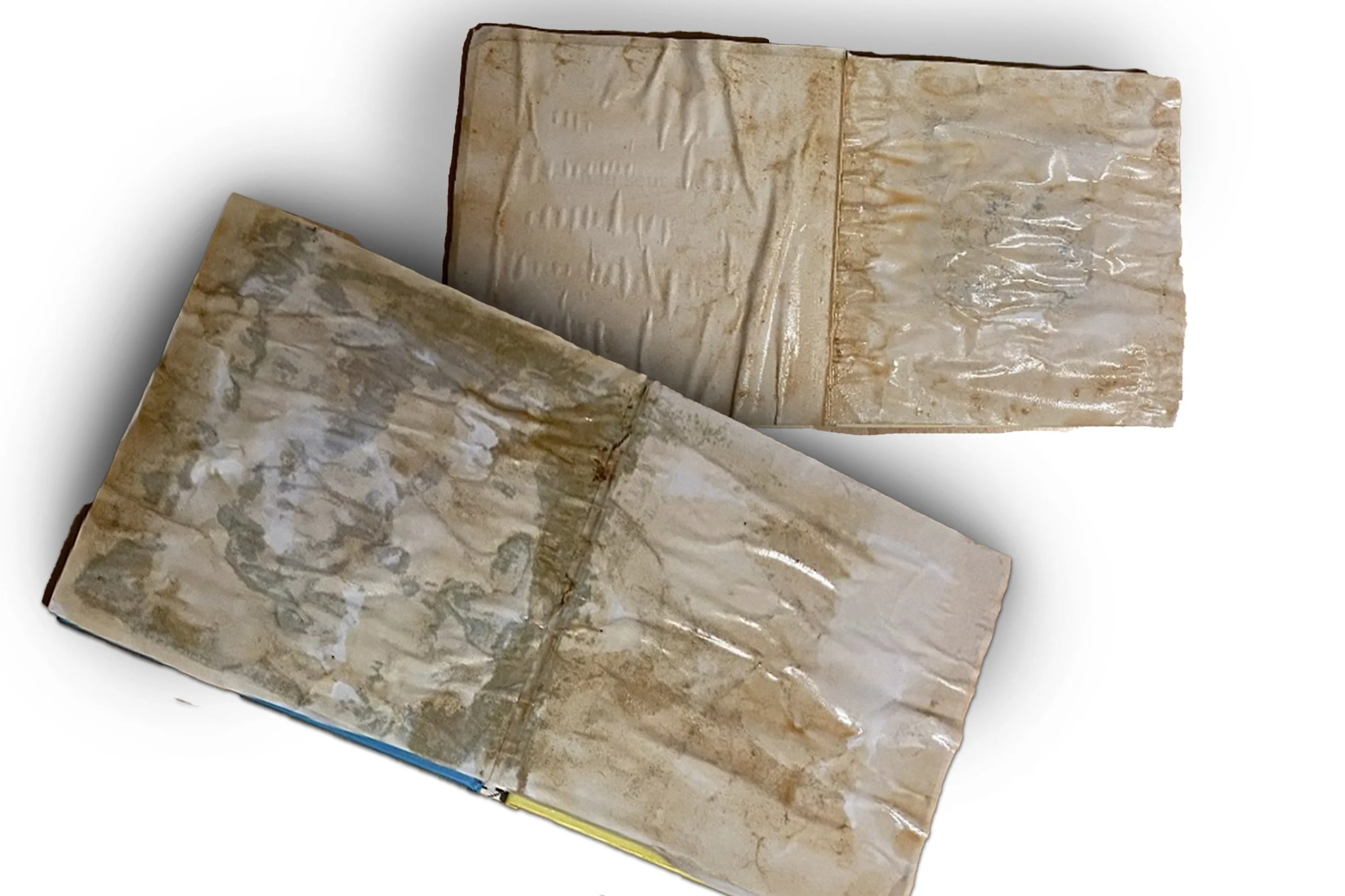 Ageing and weathering 'water-damaged' books for 'We can't be friends', a music video with a nautical theme. Click the image to watch the finished video... 