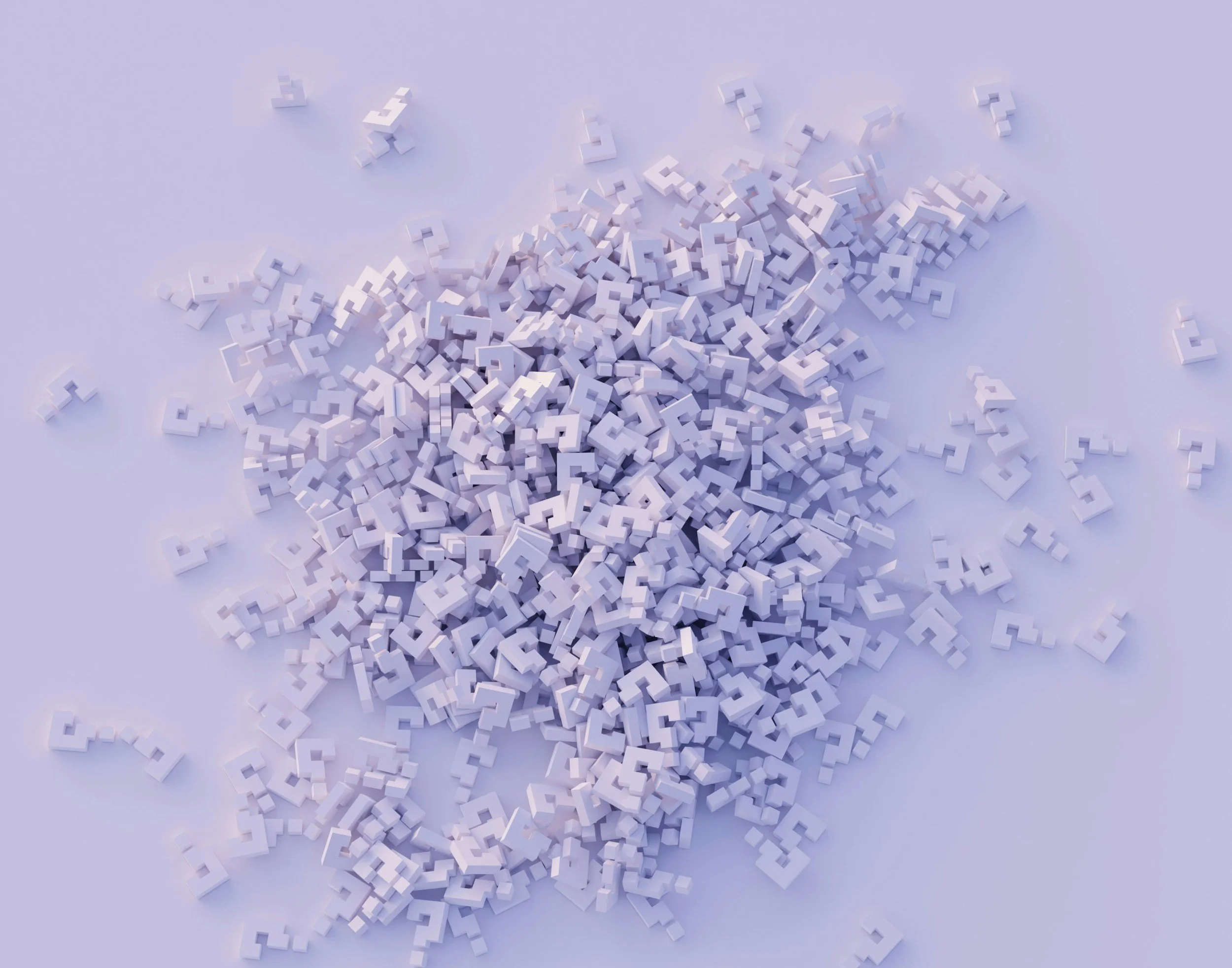Several small white 3D question mark symbols scattered across a light purple surface.