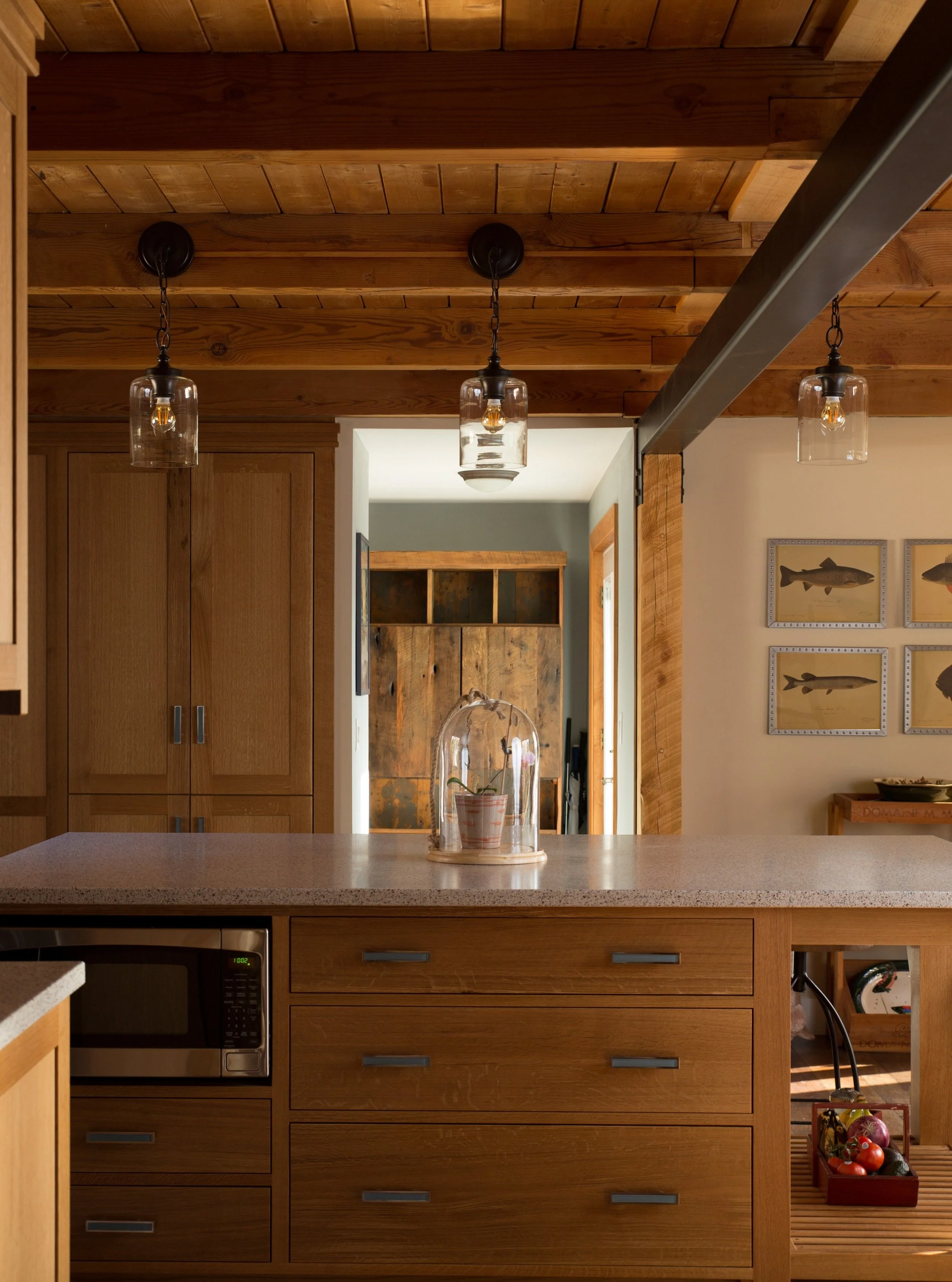 There is a difference between finding something that fits a space and creating something for it. 

Proportion. Material. Function. Finish. 

Custom details add character while answering the home's architecture. The result is something that belongs no