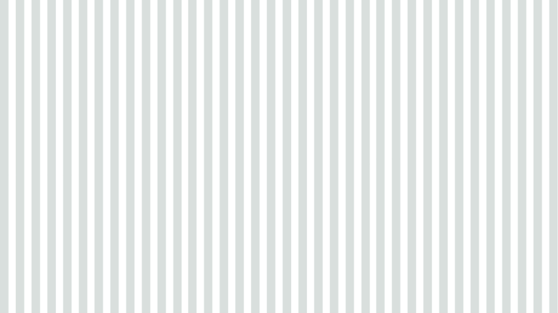 A close-up of a metal security grille with vertical slats.