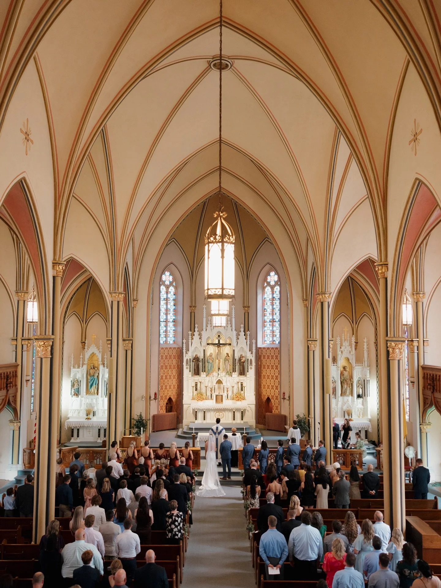 A wedding day rooted in faith, intention, and so much love 🤍Maggie &amp; Andres celebrated inside the first Basilica in Kansas (wow!), and it was breathtaking. Such a kind, genuine couple, and I&rsquo;m so thankful they trusted me to capture these m