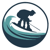 Silhouette of a surfer riding a wave