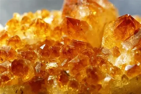 Golden citrine crystal cluster used in crystal healing sessions
