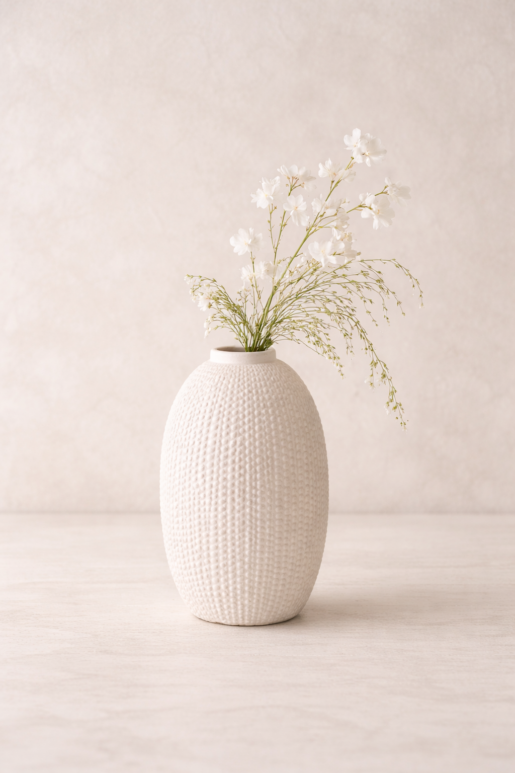 5 White Textured Ceramic Vase.png