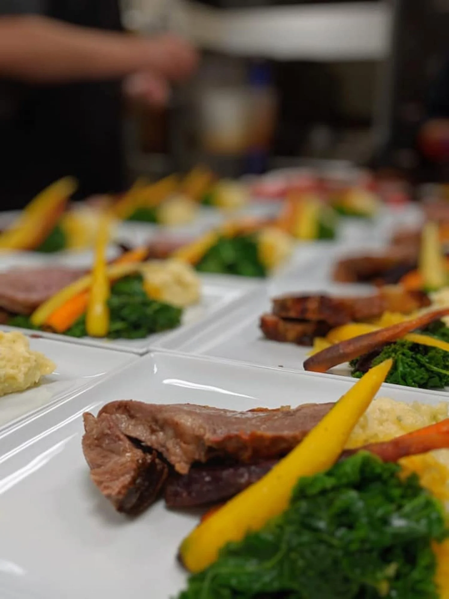 Plated celebratory dinner service at Denham Hospitality