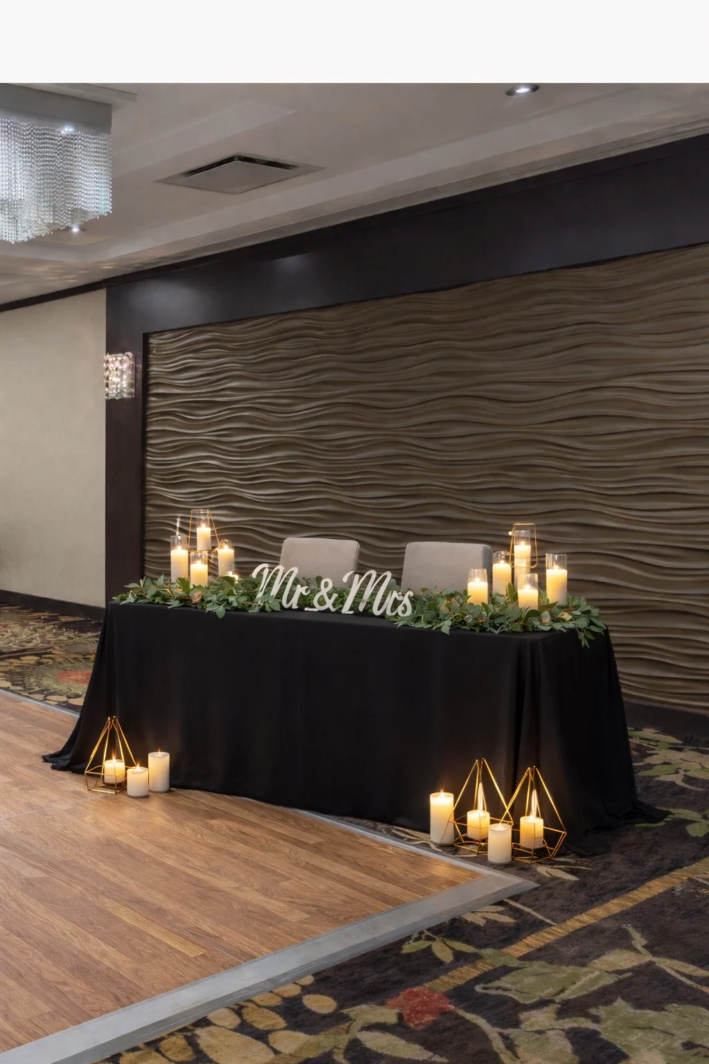 Head table for wedding reception at Denham Hospitality