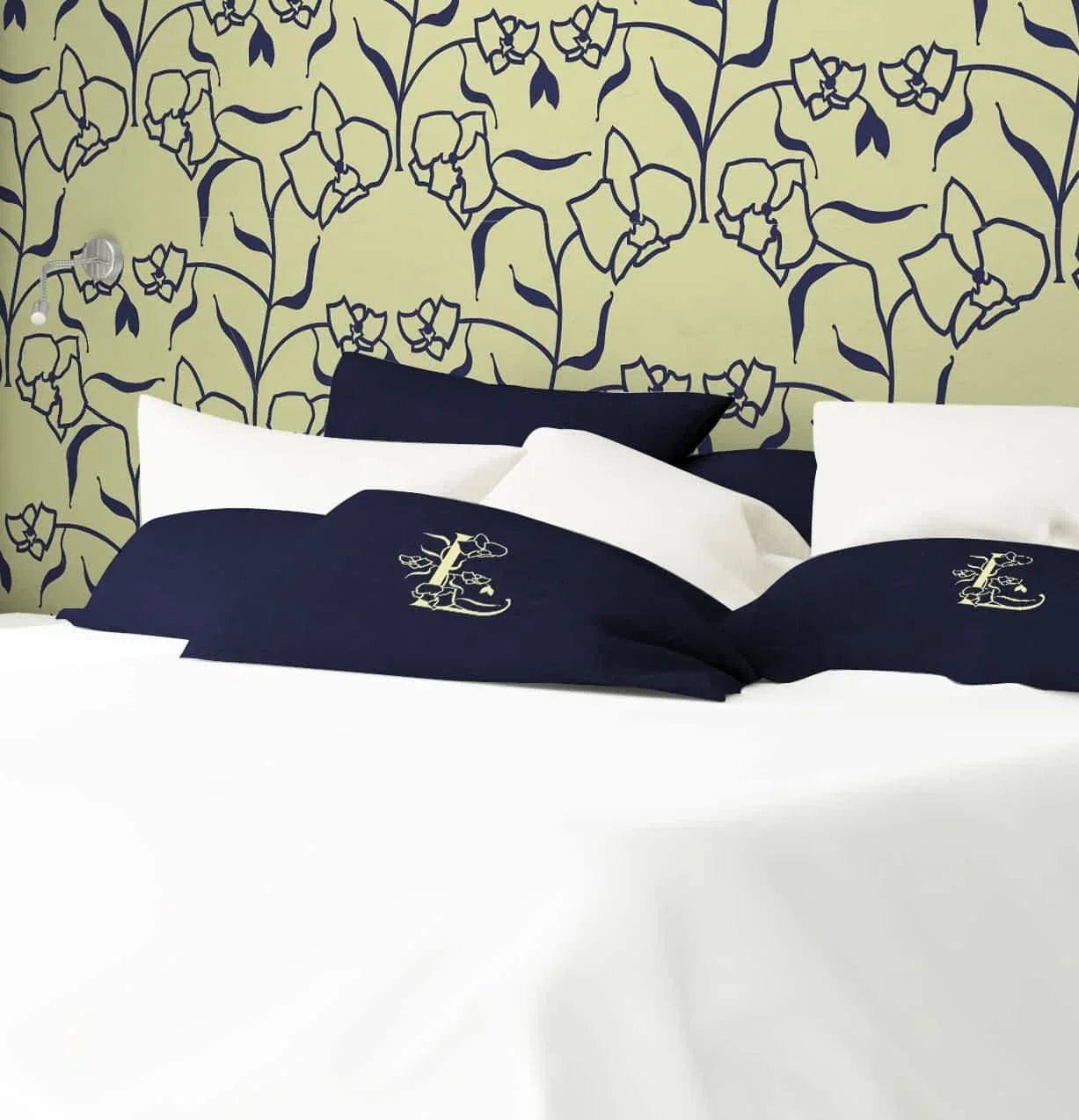 libertalia luxury hotel branding tesselated skull and orchid wallpaper illustration monogram pillows
