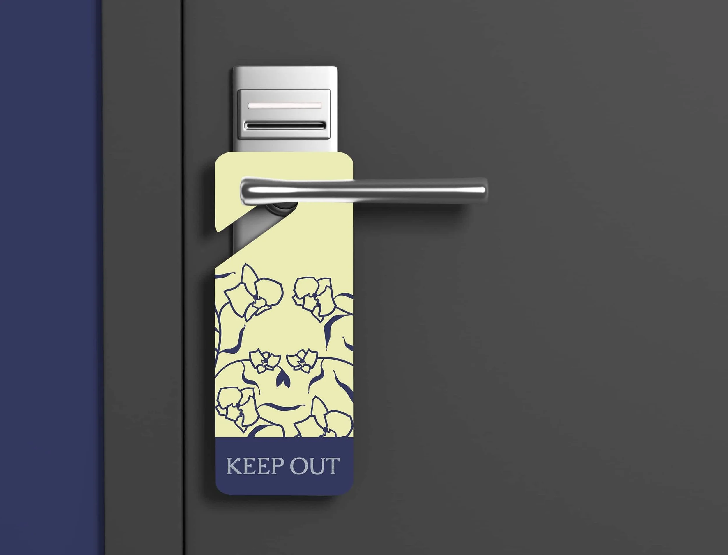 Libertalia hotel branding door hanger keep out, featuring tesselated orchid and skull illustrations.