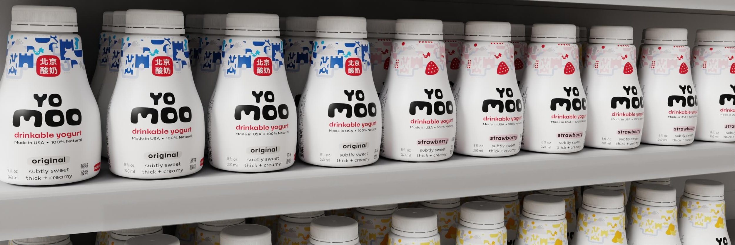 branding mockup for yomoo drinkable yogurt showing bold logo and iconography on the grocery shelf