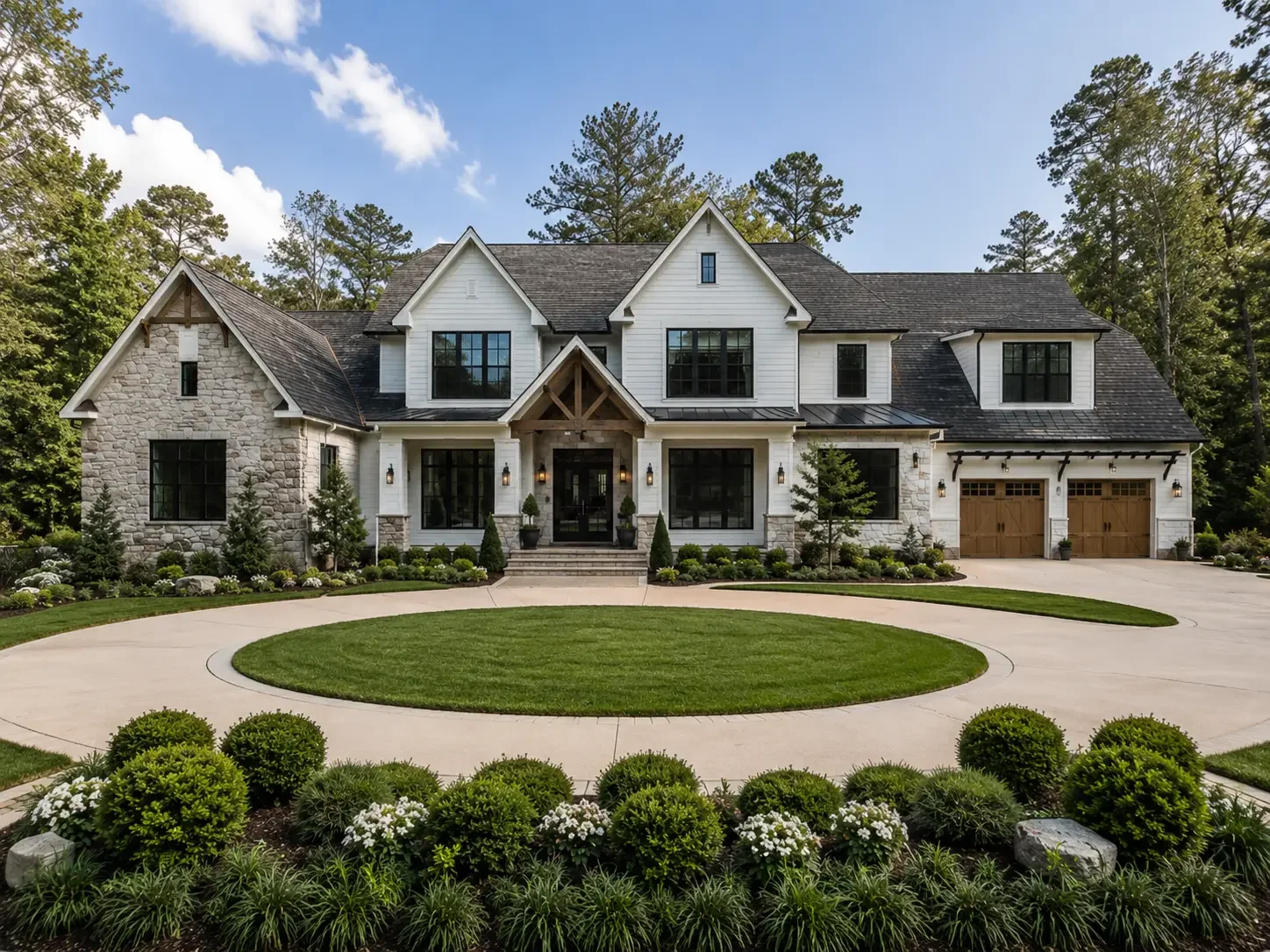 A luxury modern farmhouse custom built by Mahfoud Construction in Brookhaven, GA, featuring a stone and timber facade, a manicured circular driveway, and elegant landscaping.