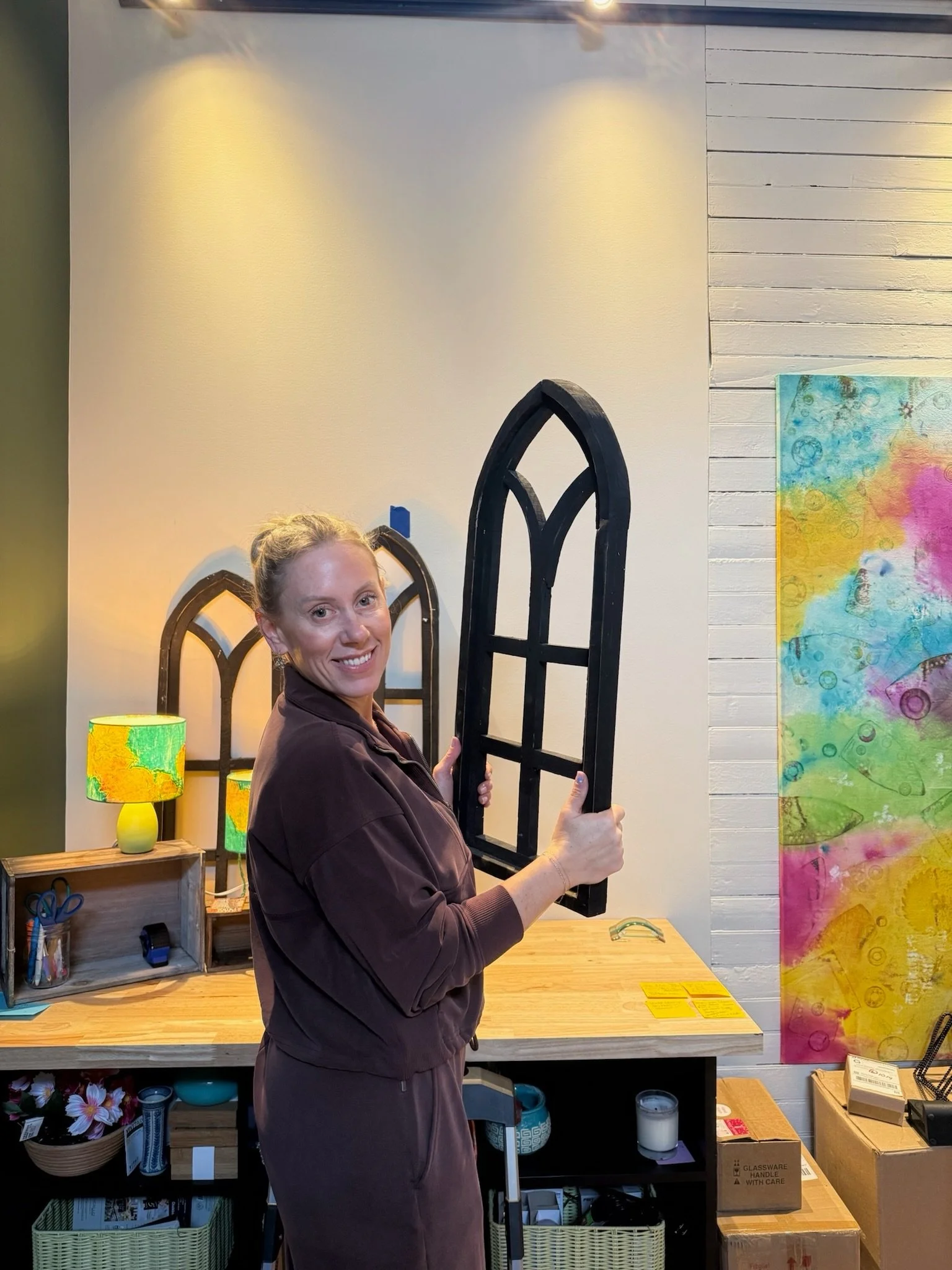One of my favorite little design elements in the shop is the set of three arched windows surrounding the Point of Sale area. I found them on a whim while visiting KOZY Cottage Furniture &amp; Decor in Oakland. The owner was helping me hunt for displa