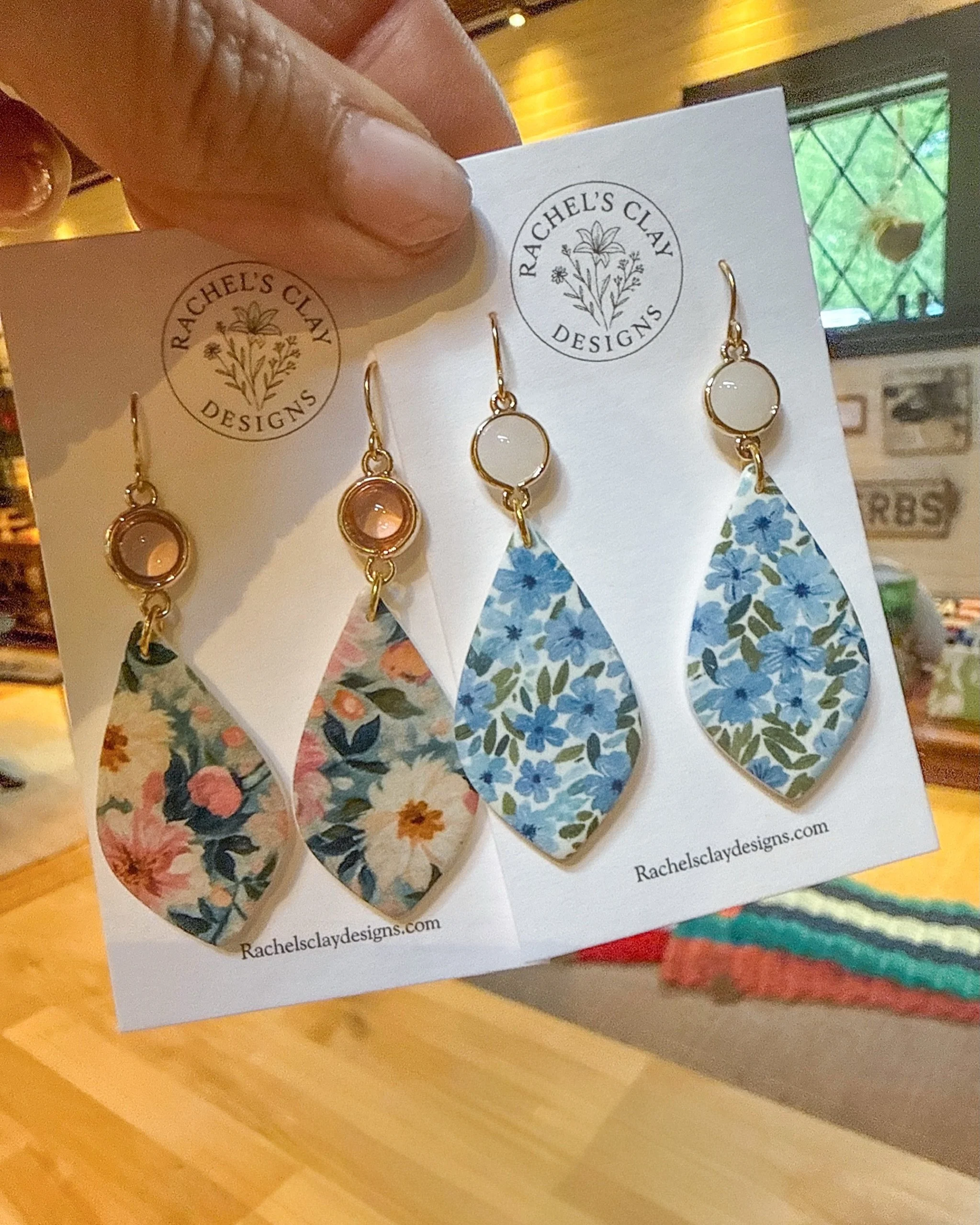 We love a statement earring! 🌸💎

Our newest arrivals from @rachelsclaydesigns are handcrafted right here in Maine. The combination of delicate florals and gold stud details makes them such a fun pop for the season.

Available now in-store! ✨