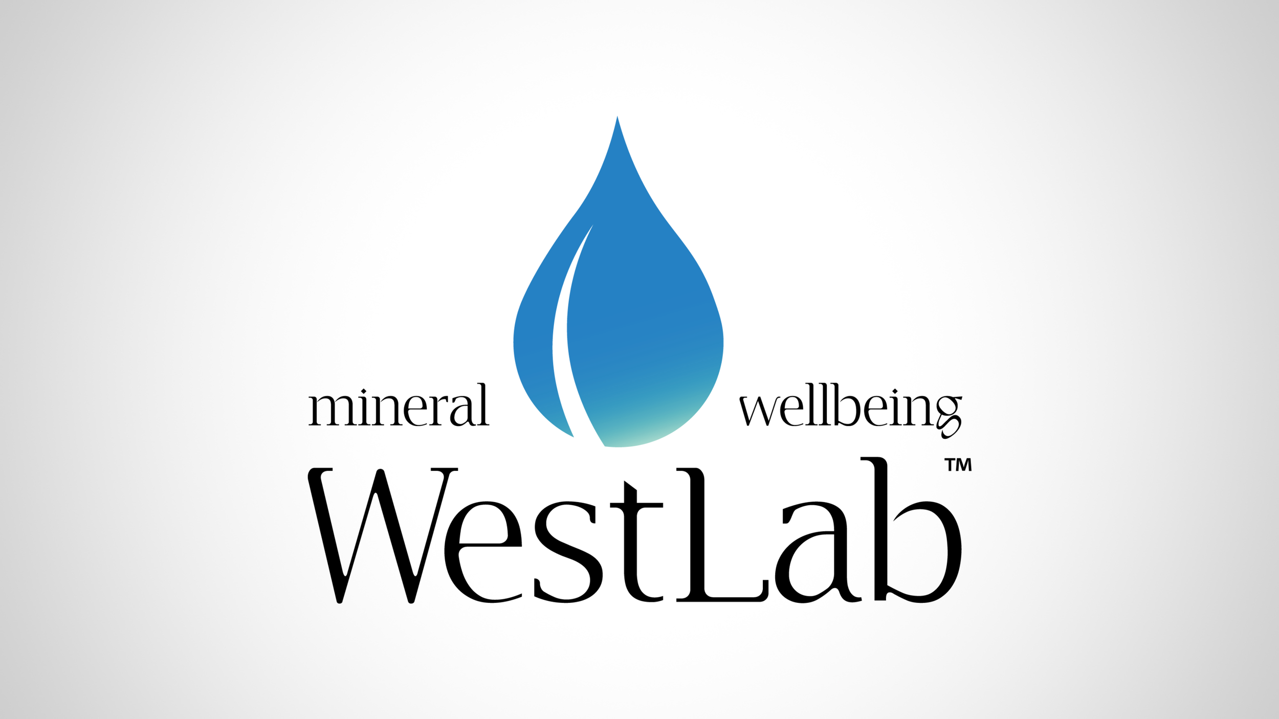 Logo for Mineral Wellbeing Westlab featuring a blue water droplet with a gradient, with the words "mineral wellbeing" on either side and "Westlab" underneath.