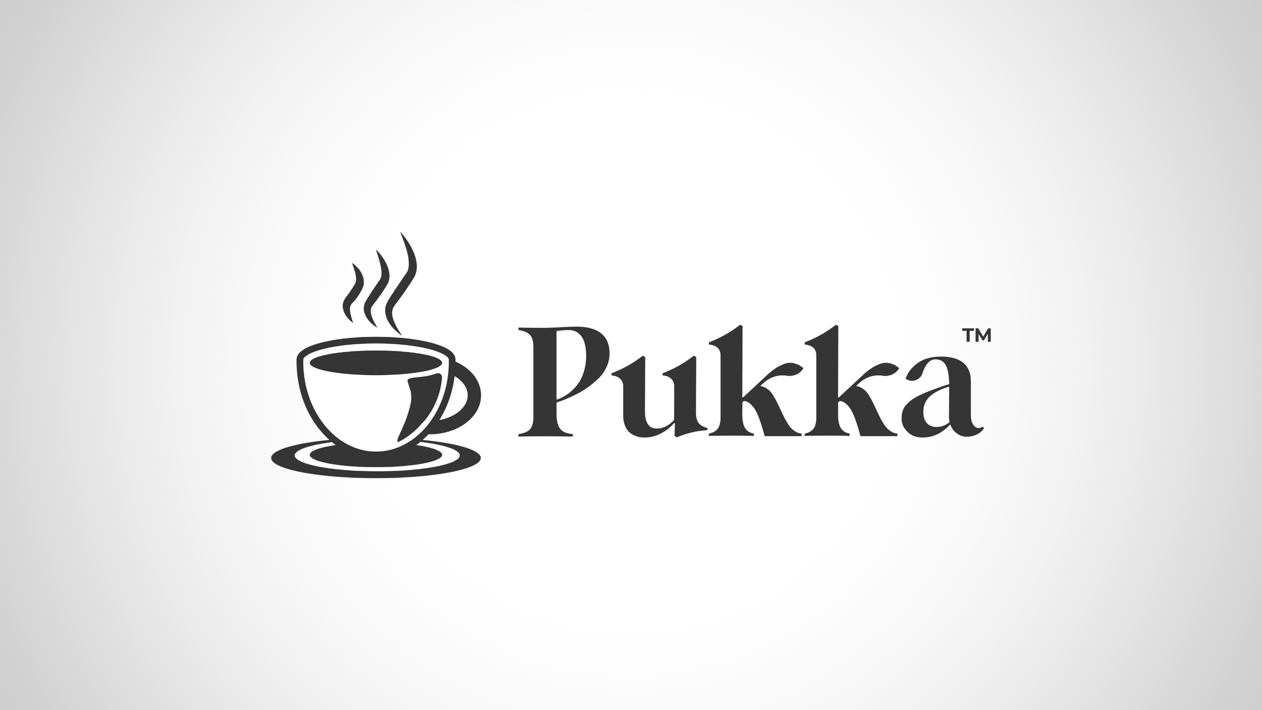 Black and white logo with a steaming coffee cup and the word "Pukka" next to it.