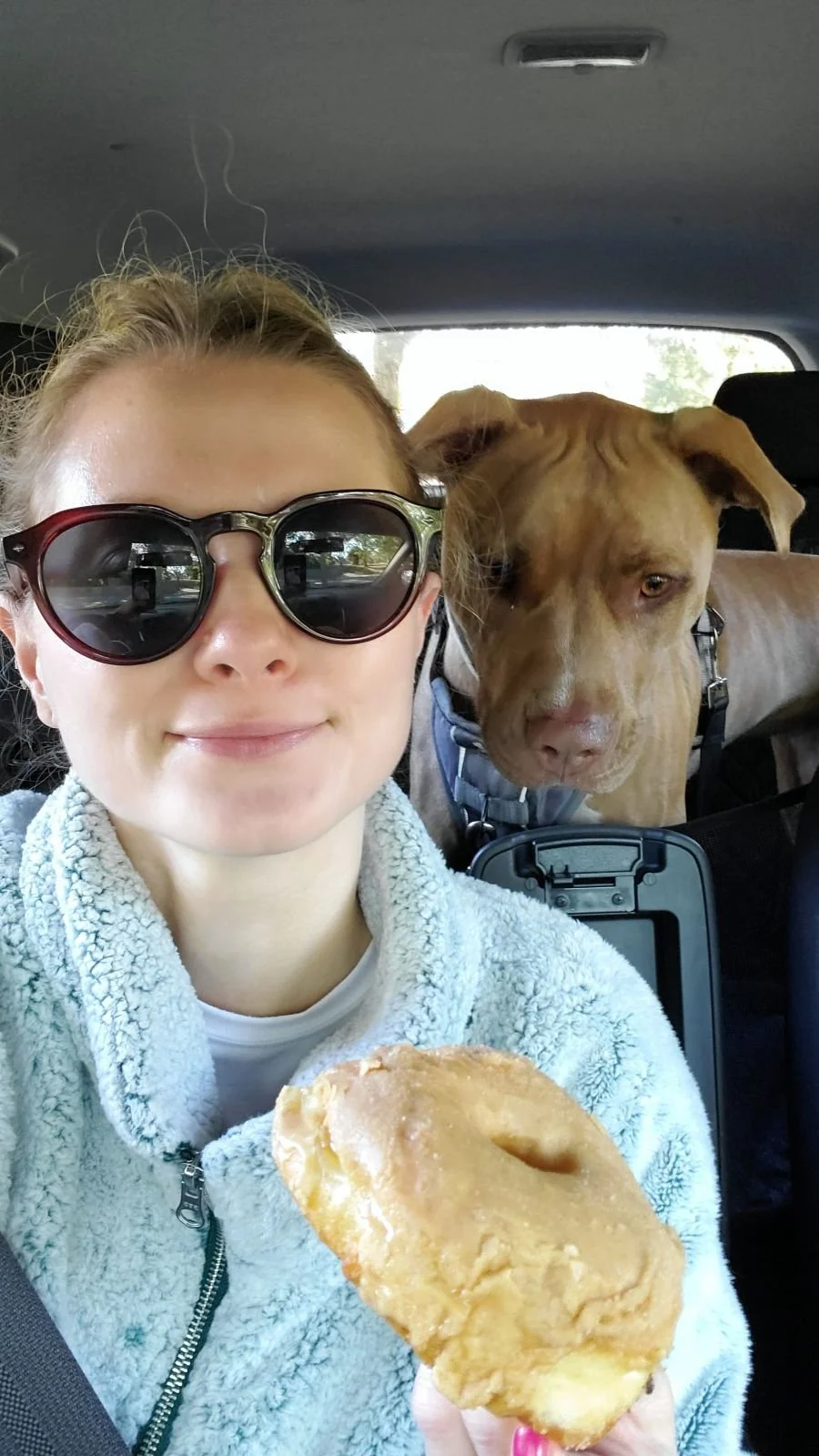 dietitian eating food showing balance alongside dog and family social aspect of food