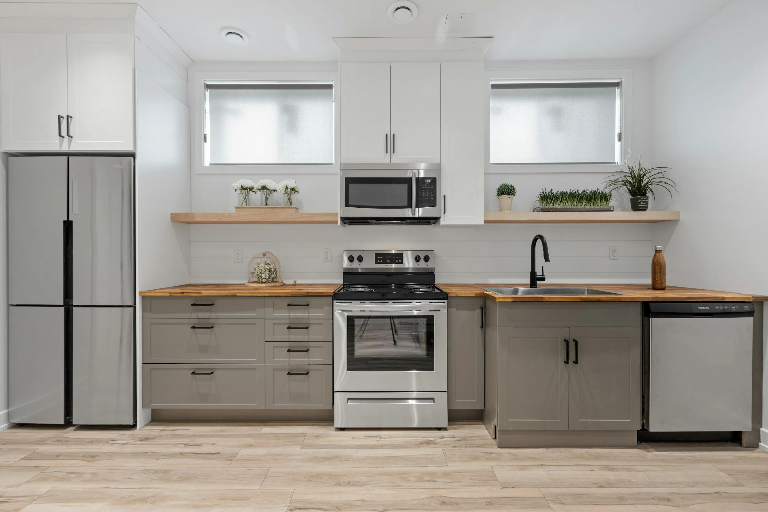 How Flooring Contractors Can Prevent a New Kitchen Floor From Trapping the Dishwasher